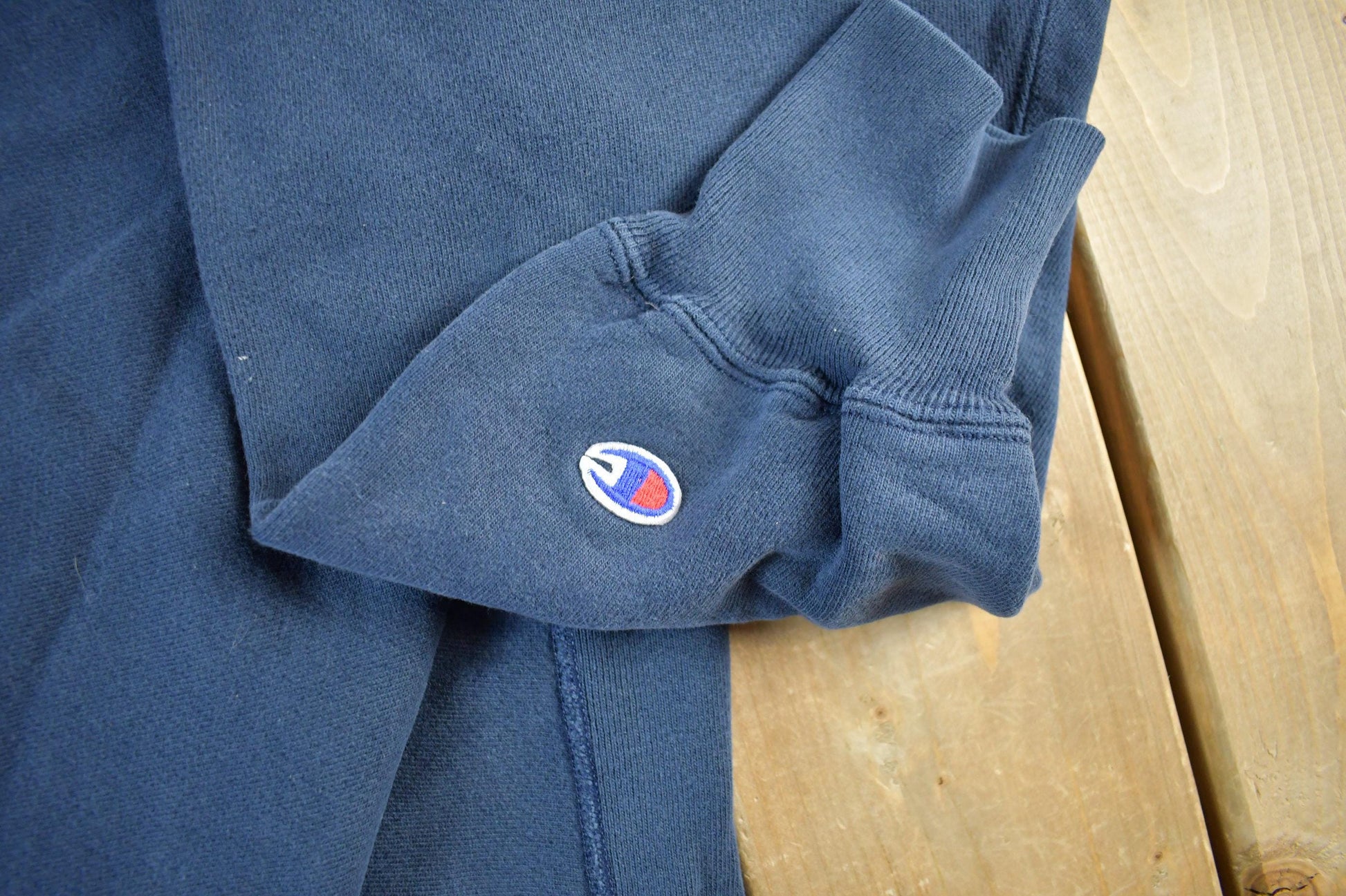 Vintage 1990s Champion Reverse Weave Navy Crewneck Sweatshirt Men's XL from propervintagecanada