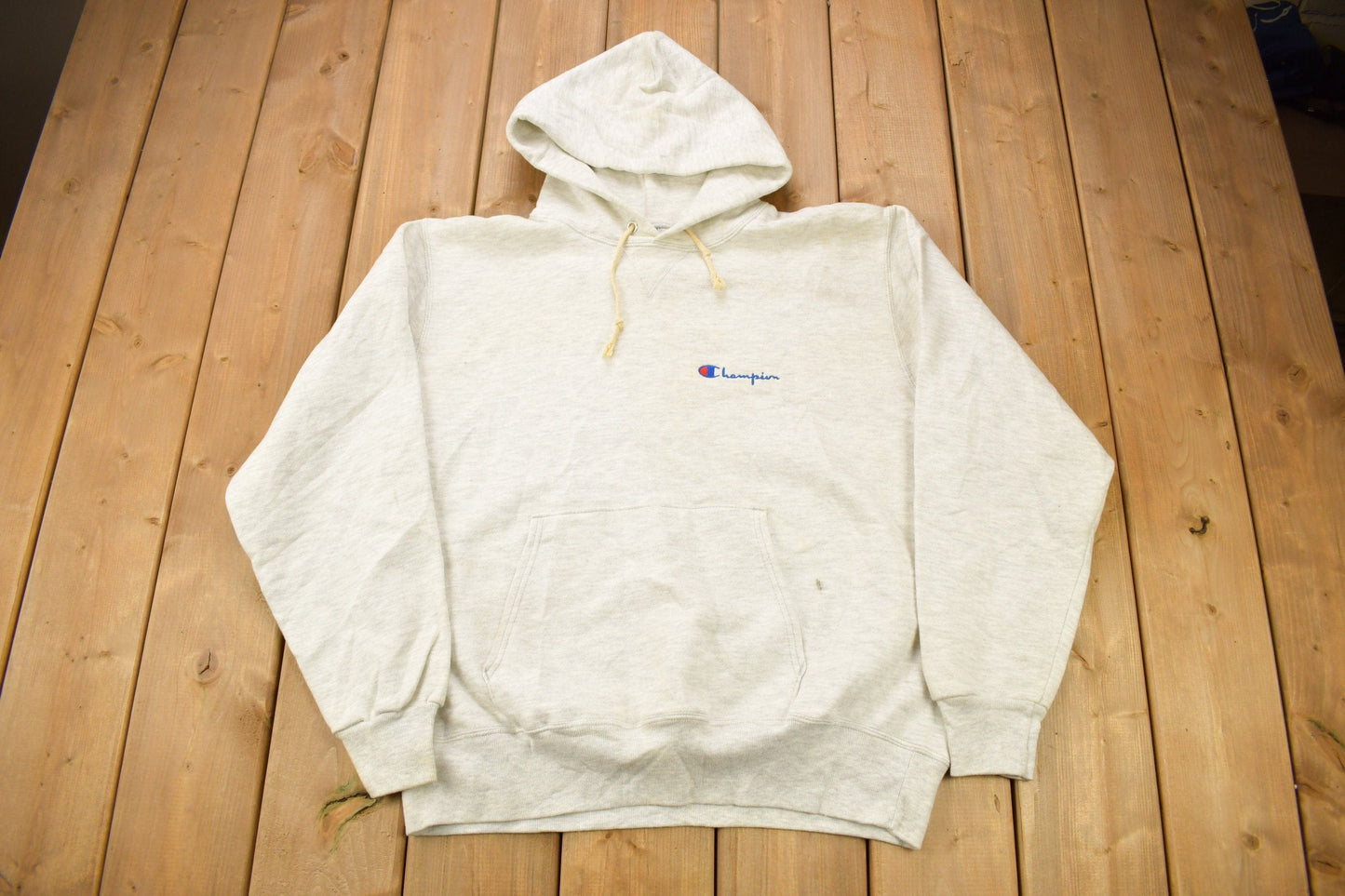 Vintage 1990s Champion Small Logo Grey Hoodie from propervintagecanada