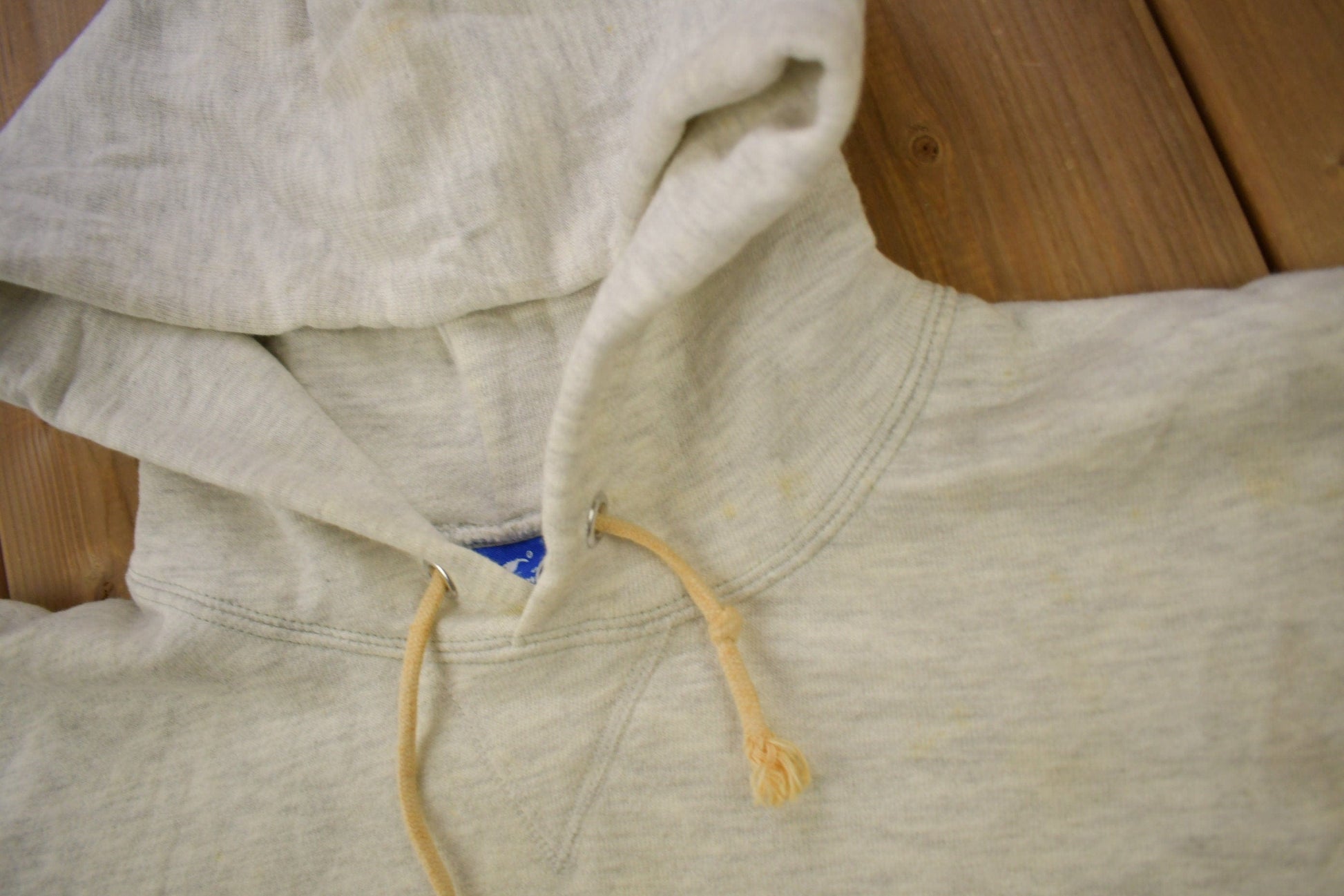 Vintage 1990s Champion Small Logo Grey Hoodie from propervintagecanada