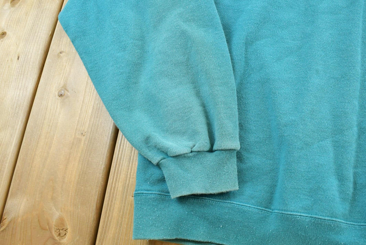 Vintage 1990s Champion Spellout Crewneck Sweatshirt Men's L from propervintagecanada