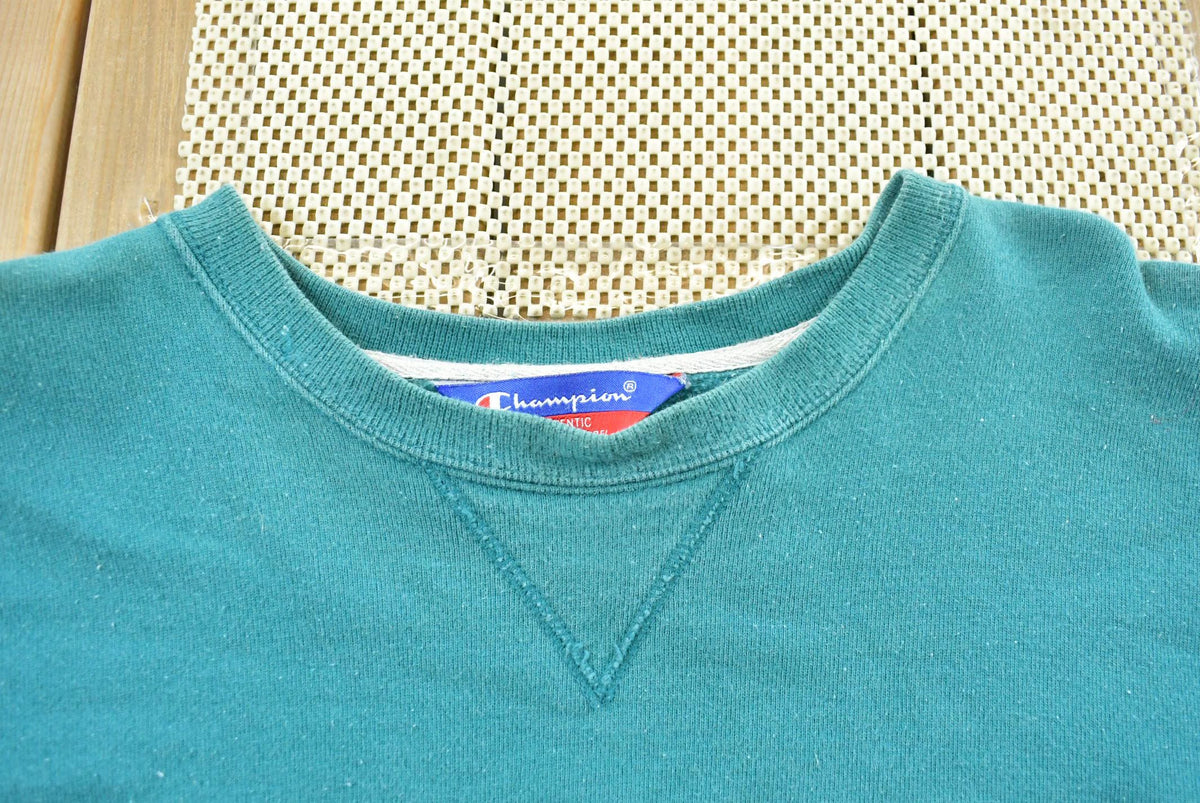 Vintage 1990s Champion Spellout Crewneck Sweatshirt Men's L from propervintagecanada