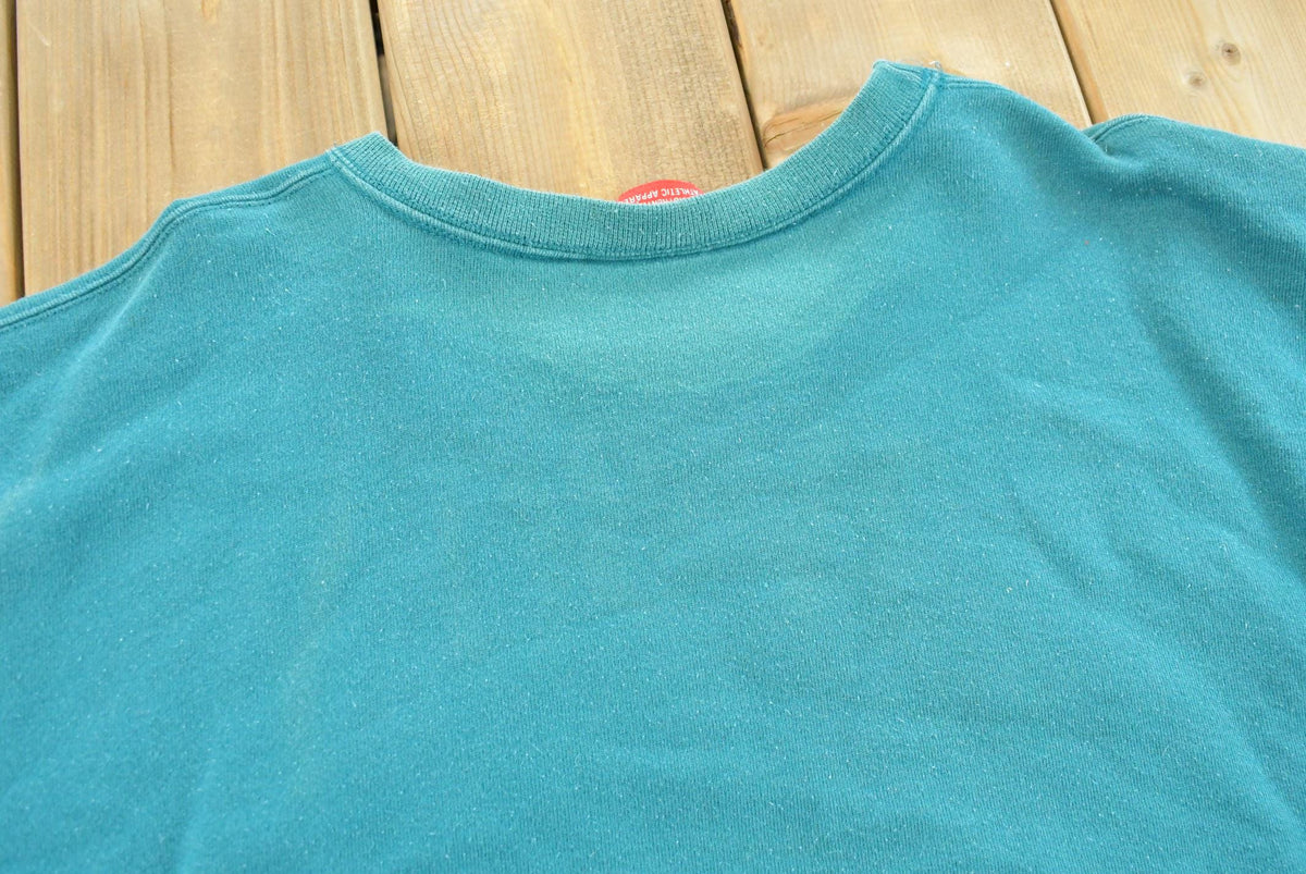Vintage 1990s Champion Spellout Crewneck Sweatshirt Men's L from propervintagecanada