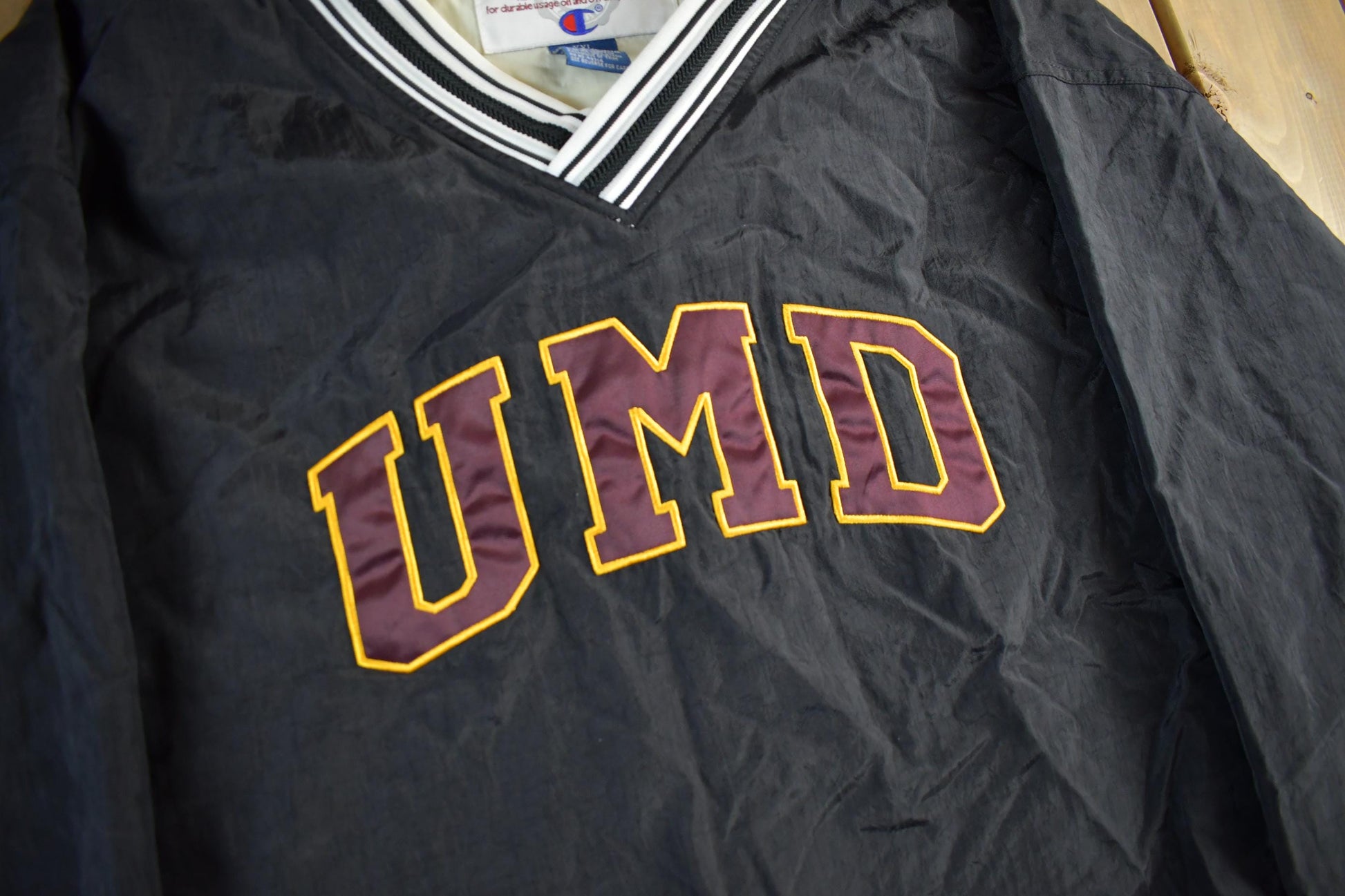 Vintage 1990s Champion University of Minnesota Duluth Champion Pullover Windbreaker Men's 2XL from propervintagecanada