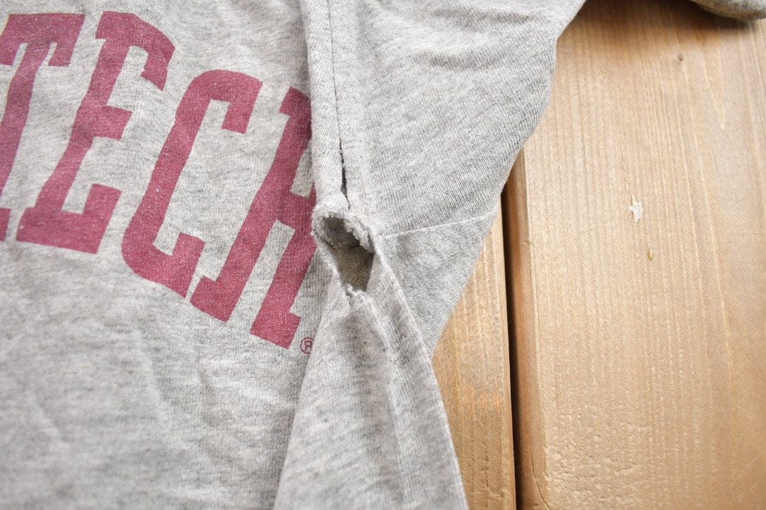 Vintage 1990s Champs Virginia Tech University Collegiate T-Shirt Men's Medium from propervintagecanada