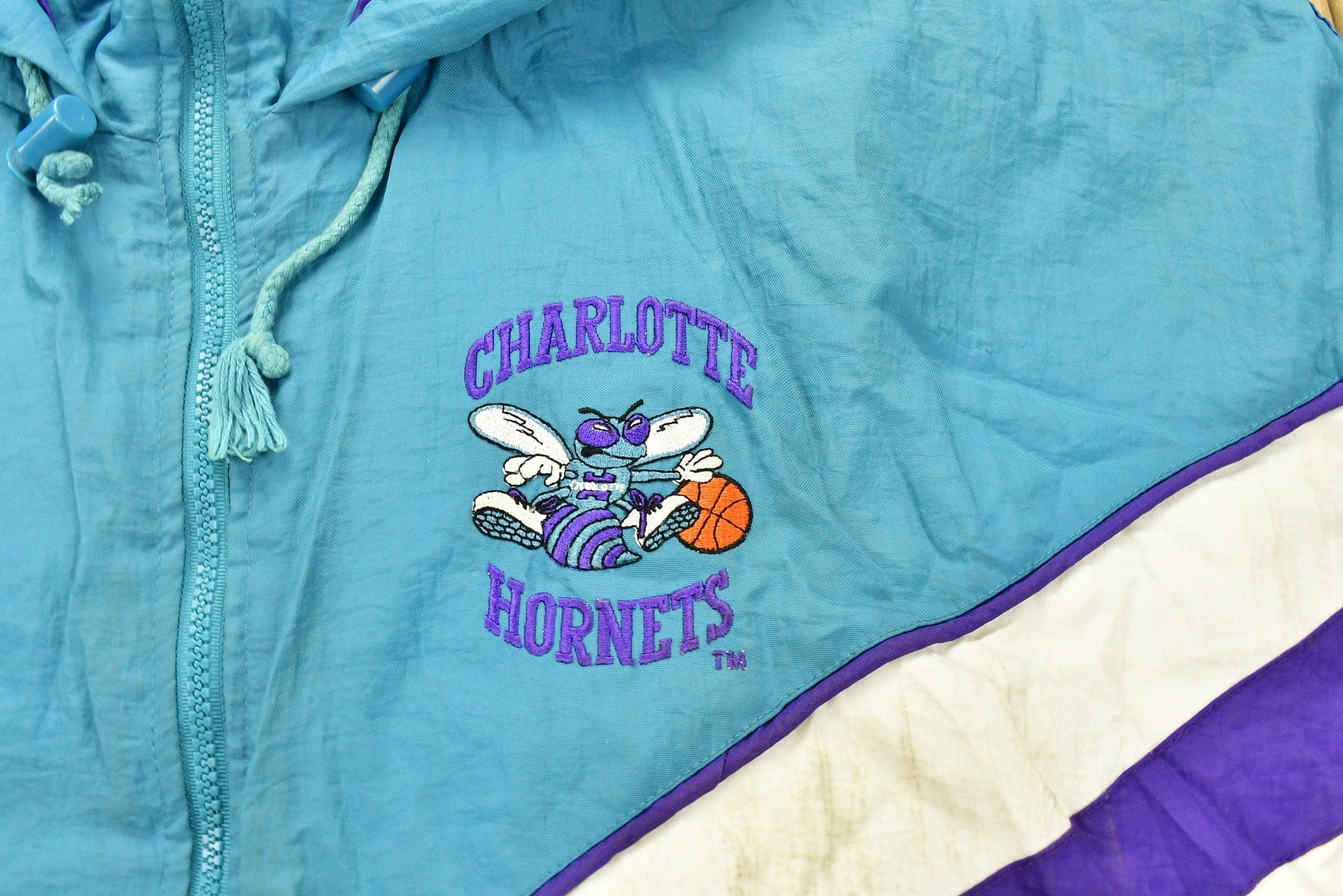 Vintage 1990s Charlotte Hornets NBA Distressed Anorak Puffer Jacket Men's XL from propervintagecanada