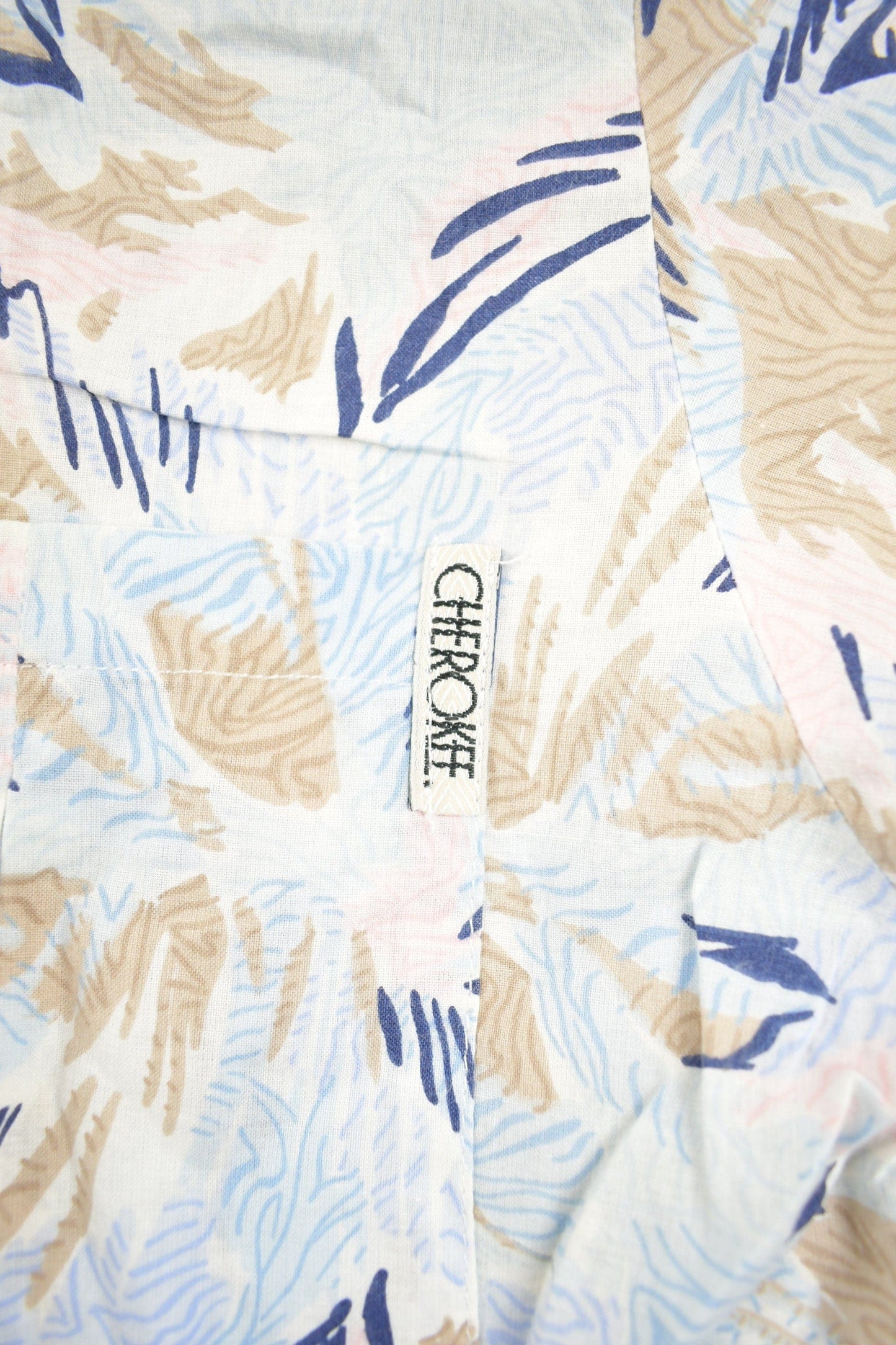 Vintage 1990s Cherokee Floral Button Up Shirt Men's XL from propervintagecanada