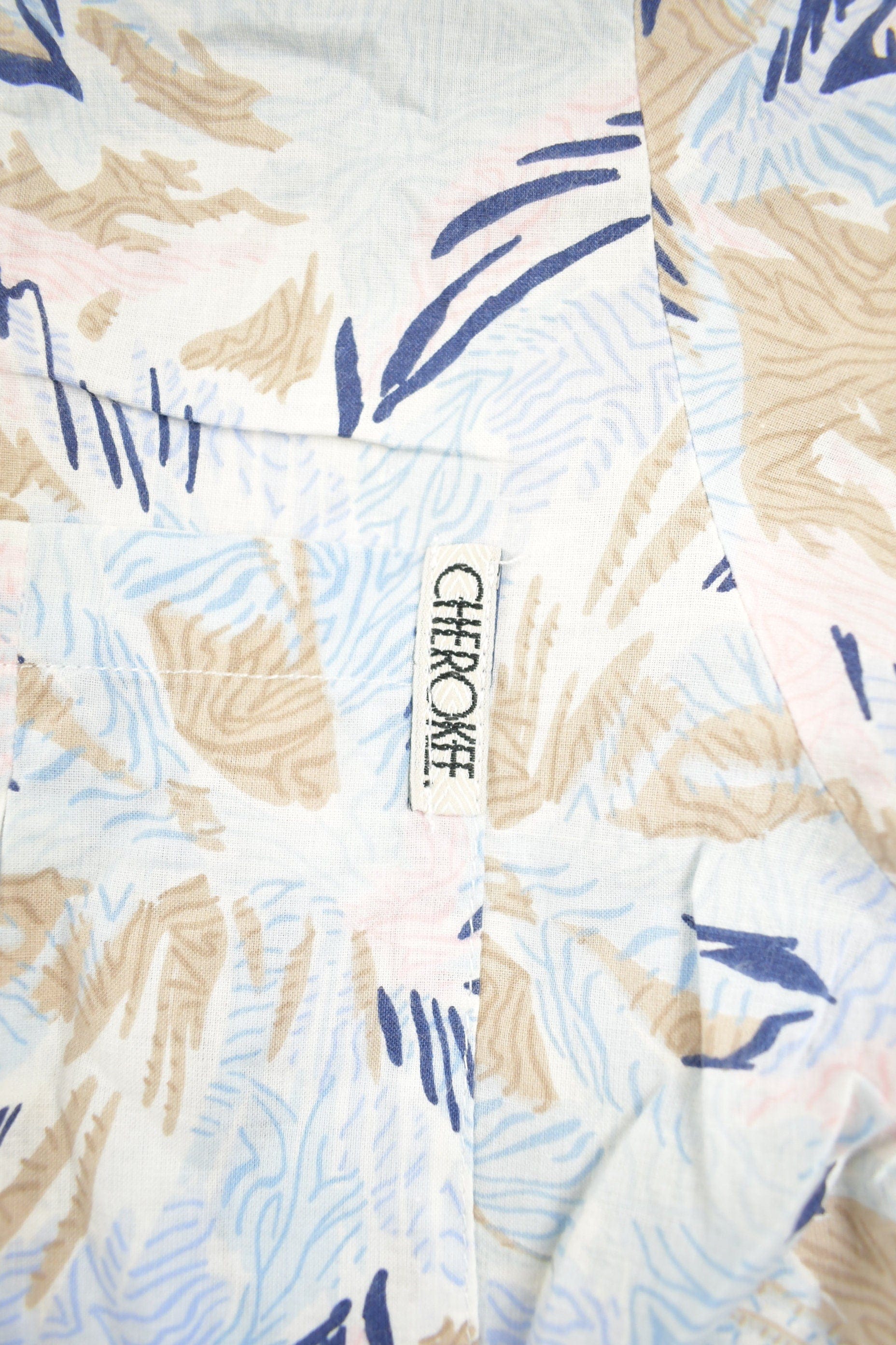 Vintage 1990s Cherokee Floral Button Up Shirt Men's XL from propervintagecanada