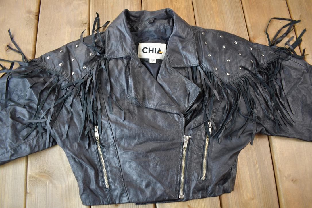 Vintage 1990s Chia Black Fringe Leather Jacket Women's XS from propervintagecanada