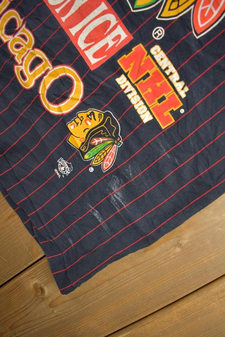 Vintage 1990s Chicago Blackhawks NHL All Over Print Graphic T-Shirt Men's Large from propervintagecanada