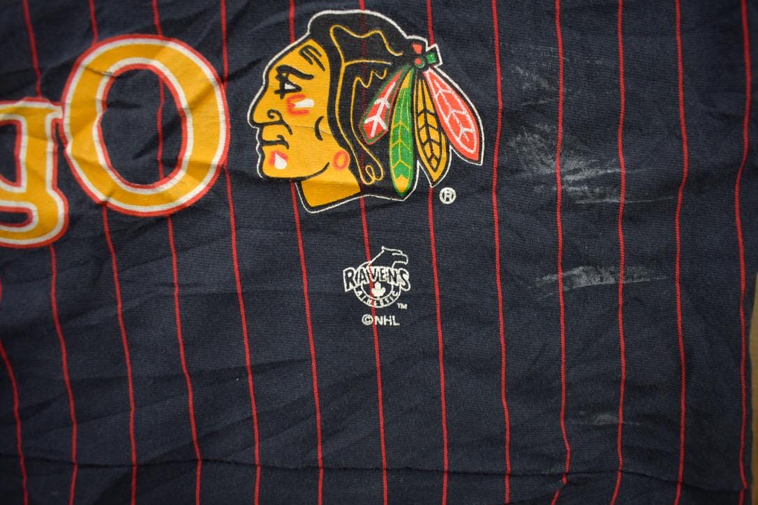 Vintage 1990s Chicago Blackhawks NHL All Over Print Graphic T-Shirt Men's Large from propervintagecanada