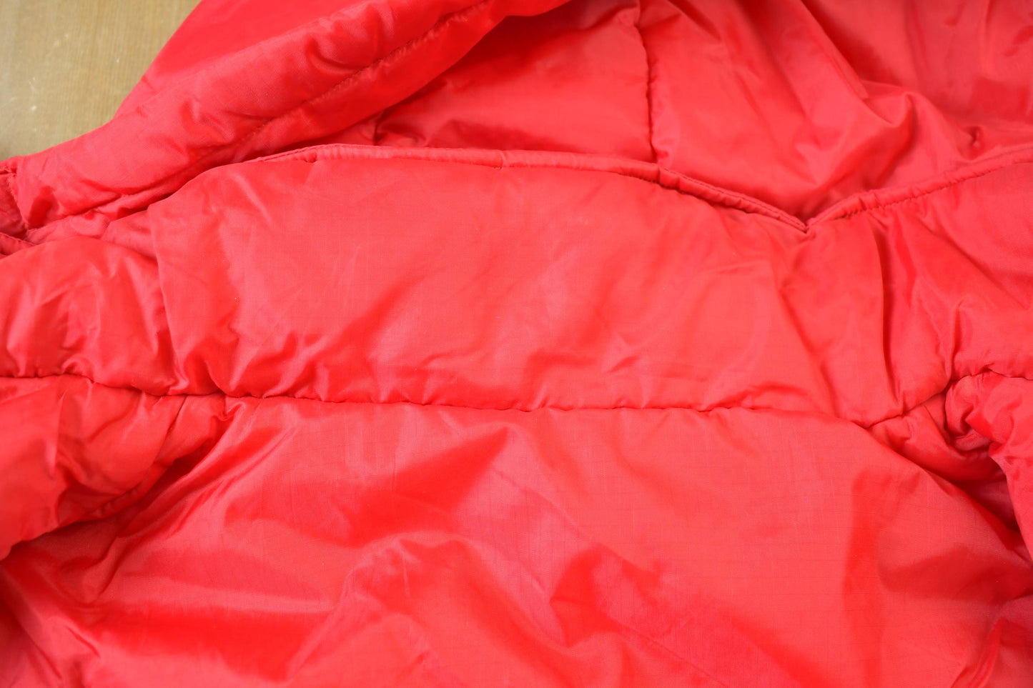 Vintage 1990s Chicago Blackhawks Reversible NHL Hockey Puffer Hooded Jacket from propervintagecanada