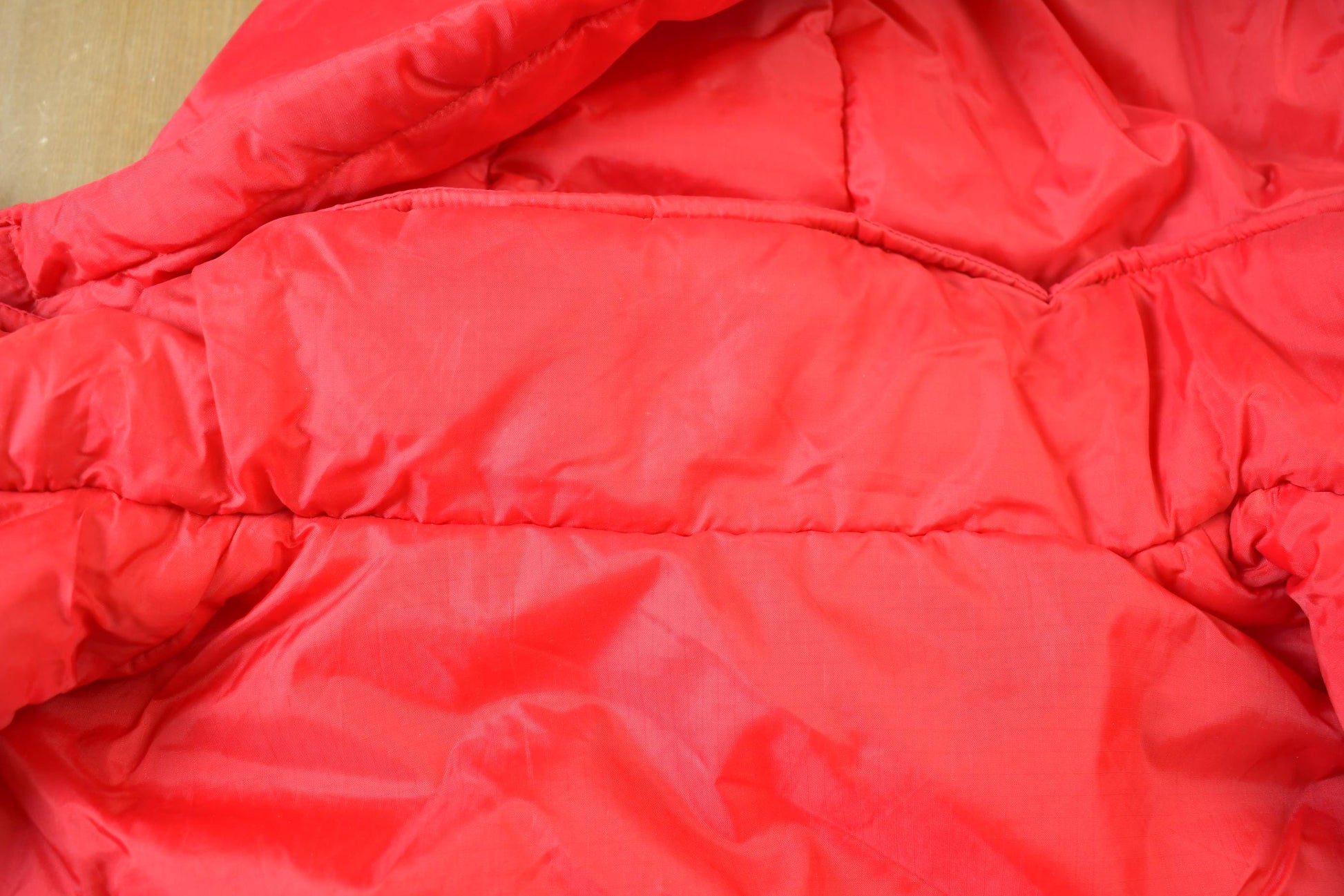 Vintage 1990s Chicago Blackhawks Reversible NHL Hockey Puffer Hooded Jacket from propervintagecanada