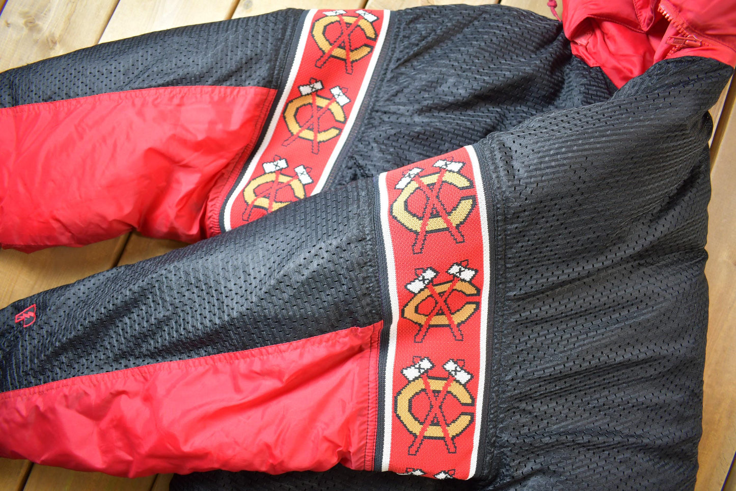 Vintage 1990s Chicago Blackhawks Reversible NHL Hockey Puffer Hooded Jacket from propervintagecanada