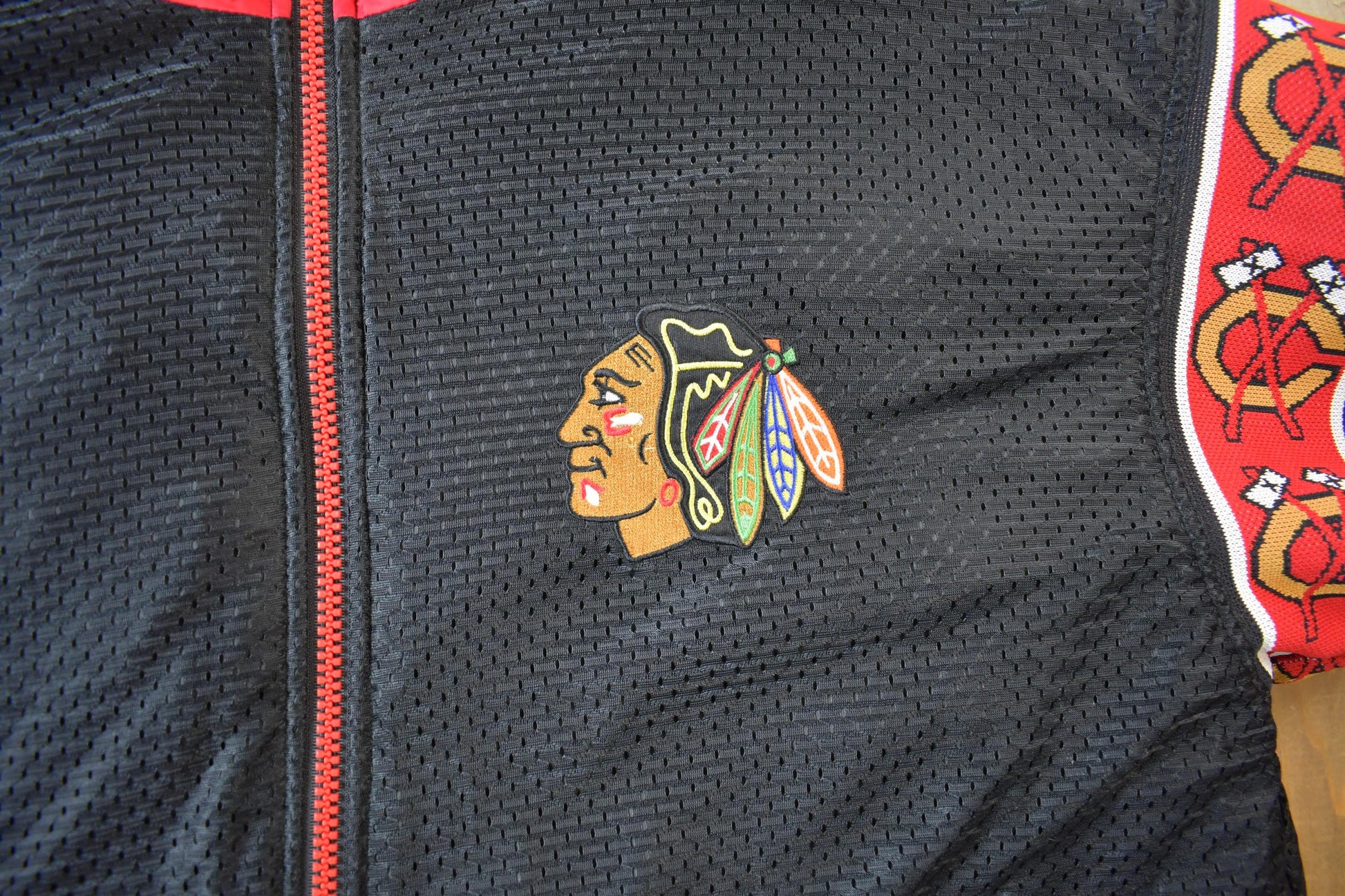 Vintage 1990s Chicago Blackhawks Reversible NHL Hockey Puffer Hooded Jacket from propervintagecanada