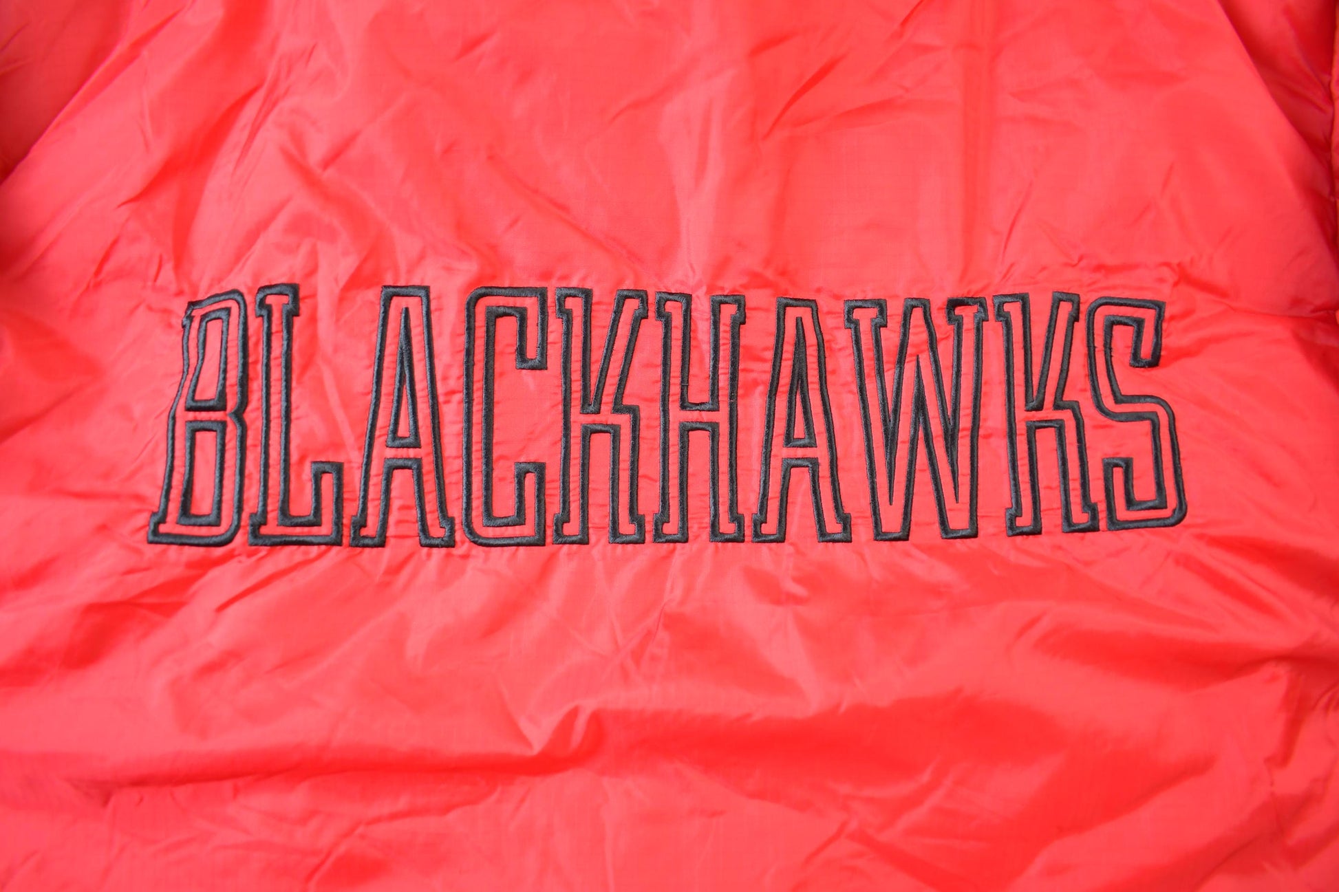 Vintage 1990s Chicago Blackhawks Reversible NHL Hockey Puffer Hooded Jacket from propervintagecanada