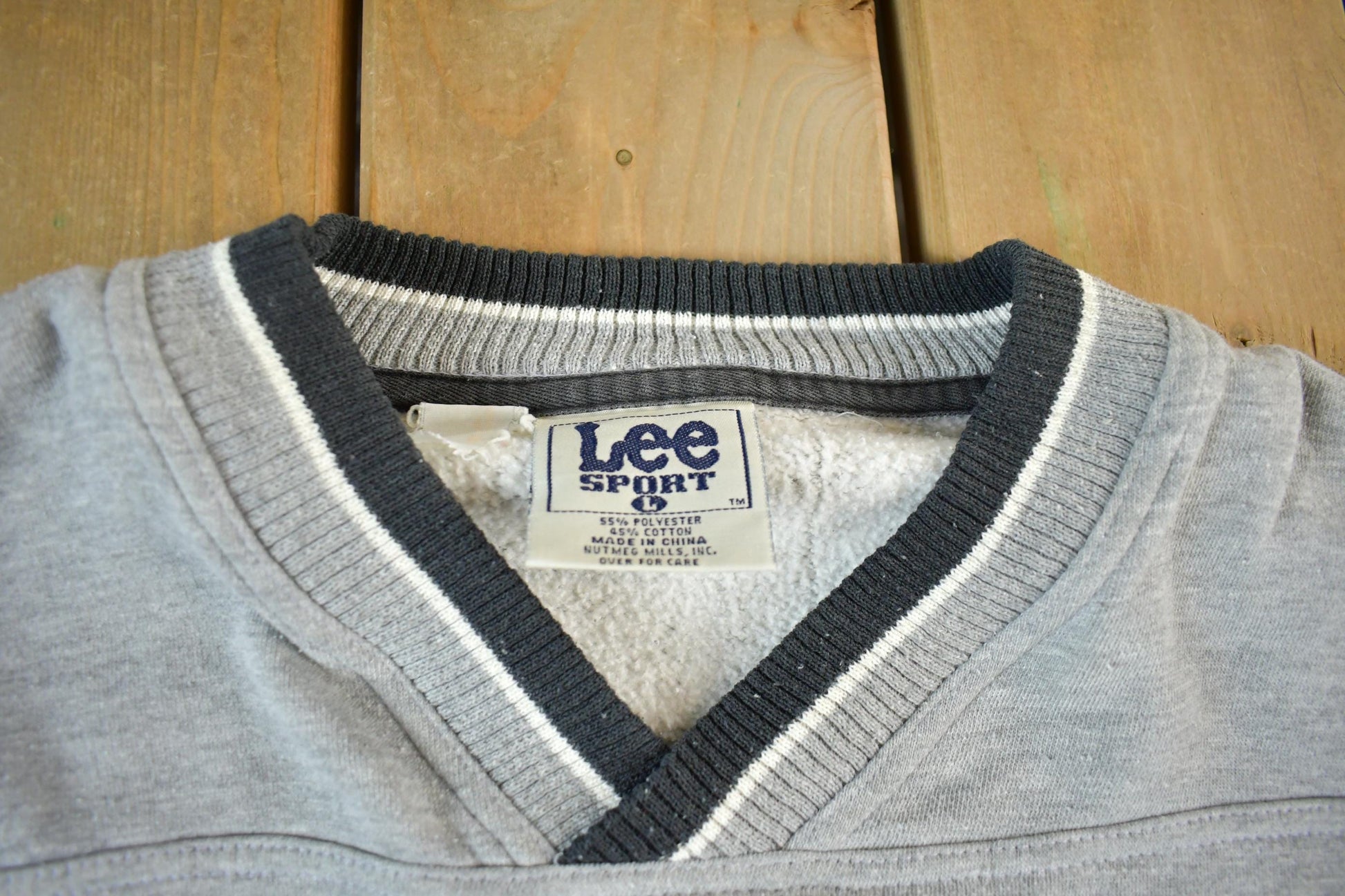 Vintage 1990s Chicago Bulls NBA V Neck Sweatshirt Men's Large from propervintagecanada