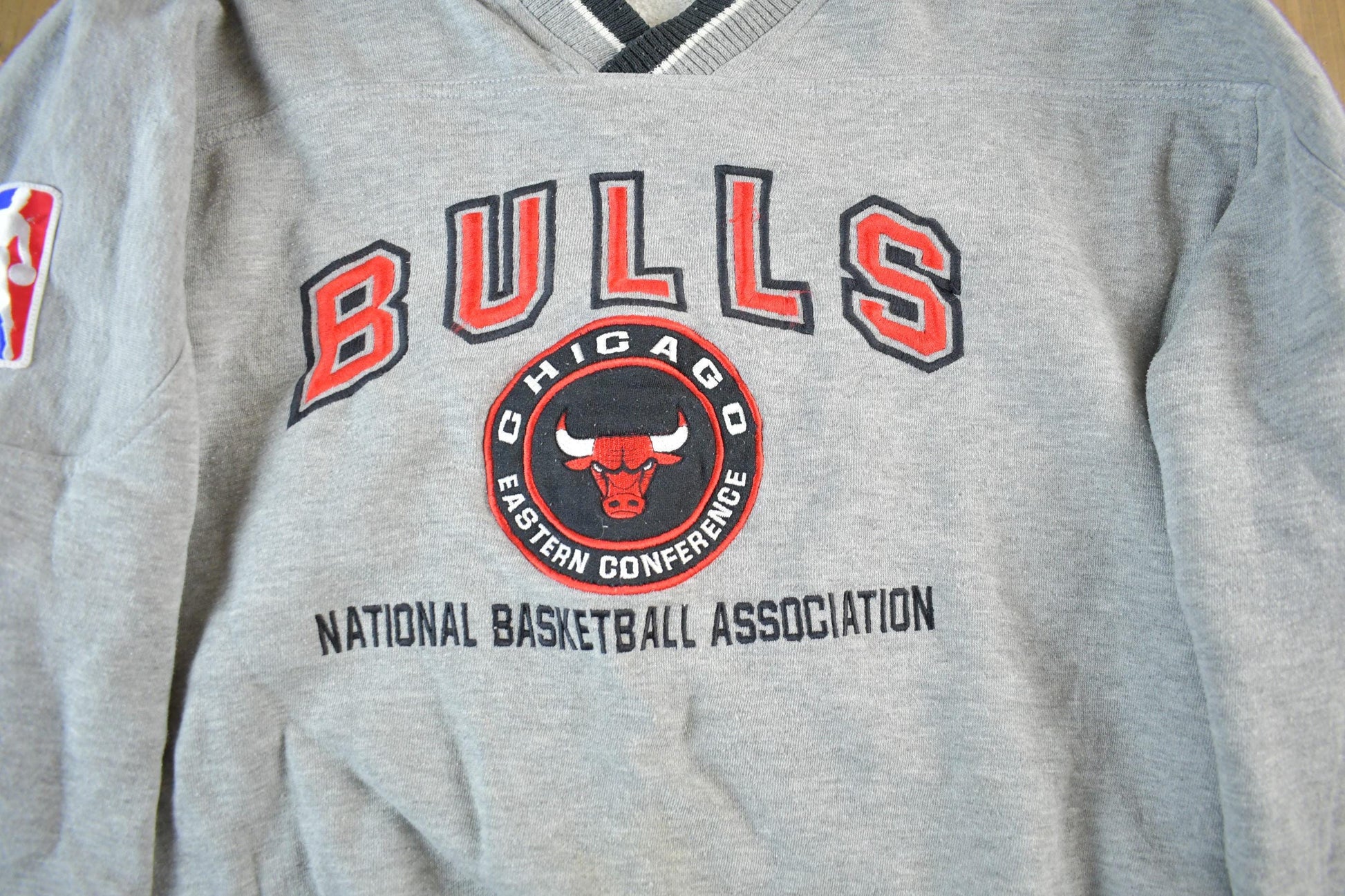 Vintage 1990s Chicago Bulls NBA V Neck Sweatshirt Men's Large from propervintagecanada