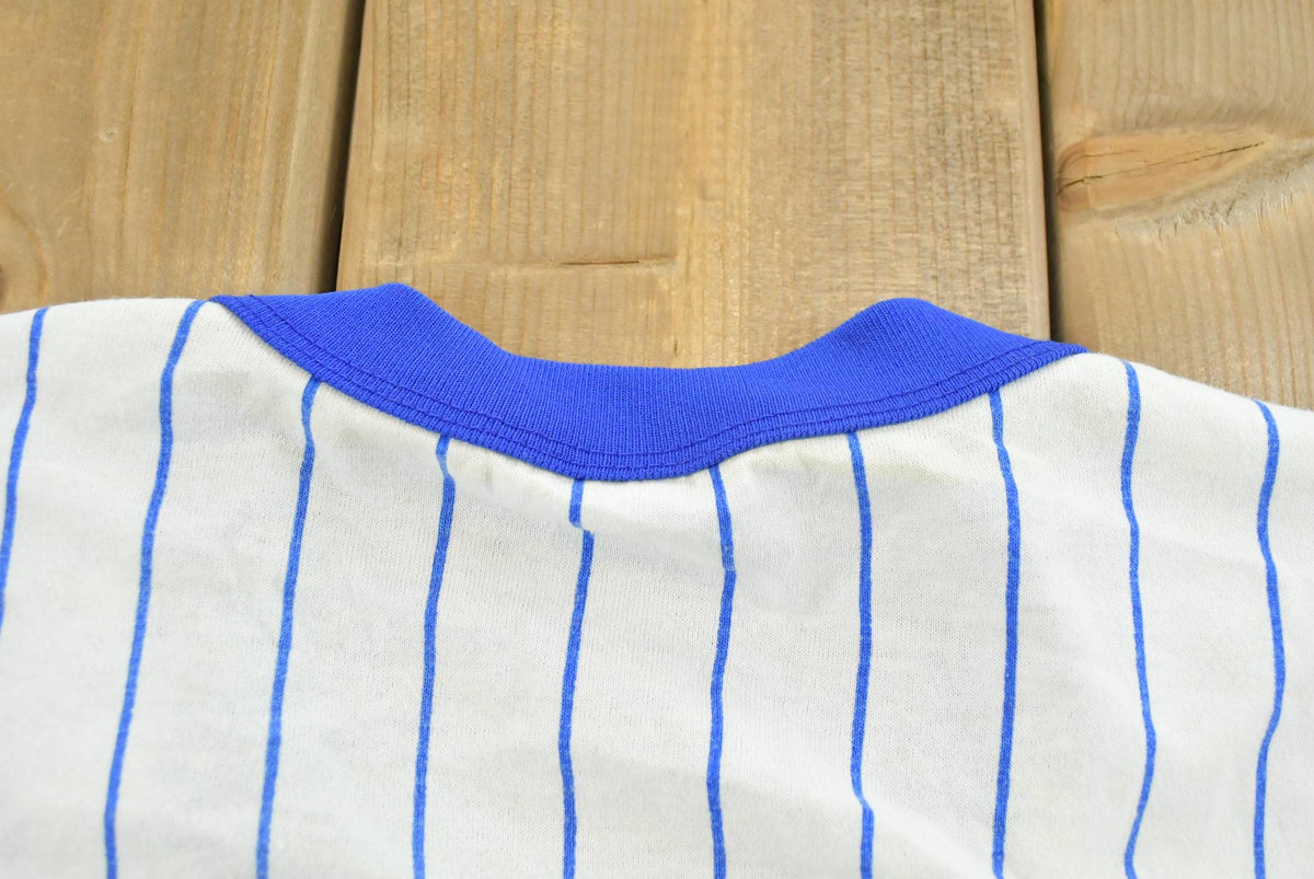 Vintage 1990s Chicago Cubs Majestic Pinstripe Ringer T-Shirt Mens M from propervintagecanada