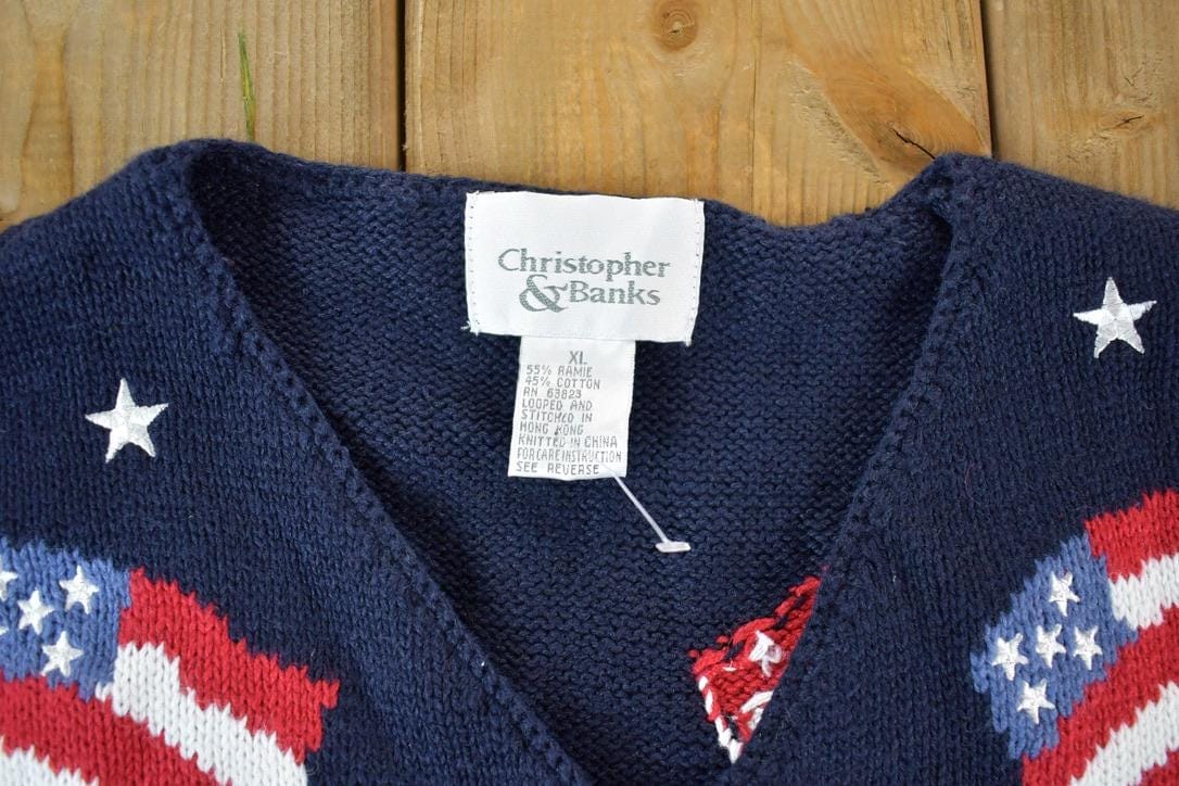 Vintage 1990s Christopher & Banks AOP American Flag Knit Abstract Pattern Cardigan Sweater Vest Men's XL from propervintagecanada