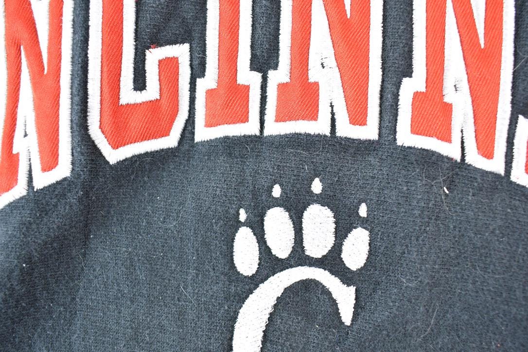Vintage 1990s Cincinnati University Collegiate Steve And Barry's Reverse Grain Hoodie Men's Large from propervintagecanada