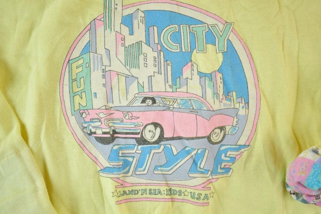 Vintage 1990s City Style Super Unique Collared Pink Cadillac Crewneck Sweatshirt Made In USAMen's Medium from propervintagecanada