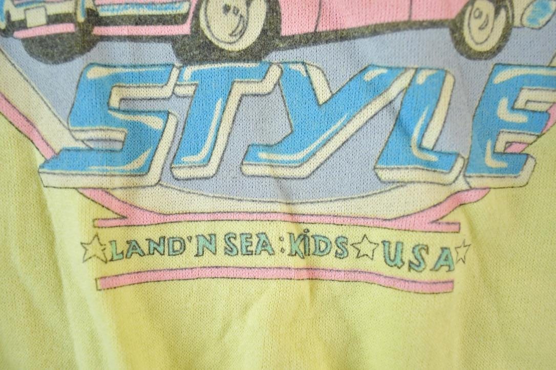 Vintage 1990s City Style Super Unique Collared Pink Cadillac Crewneck Sweatshirt Made In USAMen's Medium from propervintagecanada