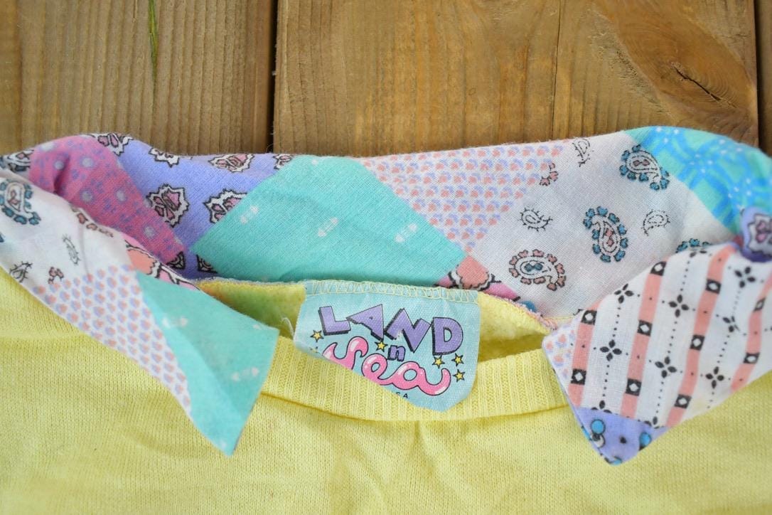 Vintage 1990s City Style Super Unique Collared Pink Cadillac Crewneck Sweatshirt Made In USAMen's Medium from propervintagecanada