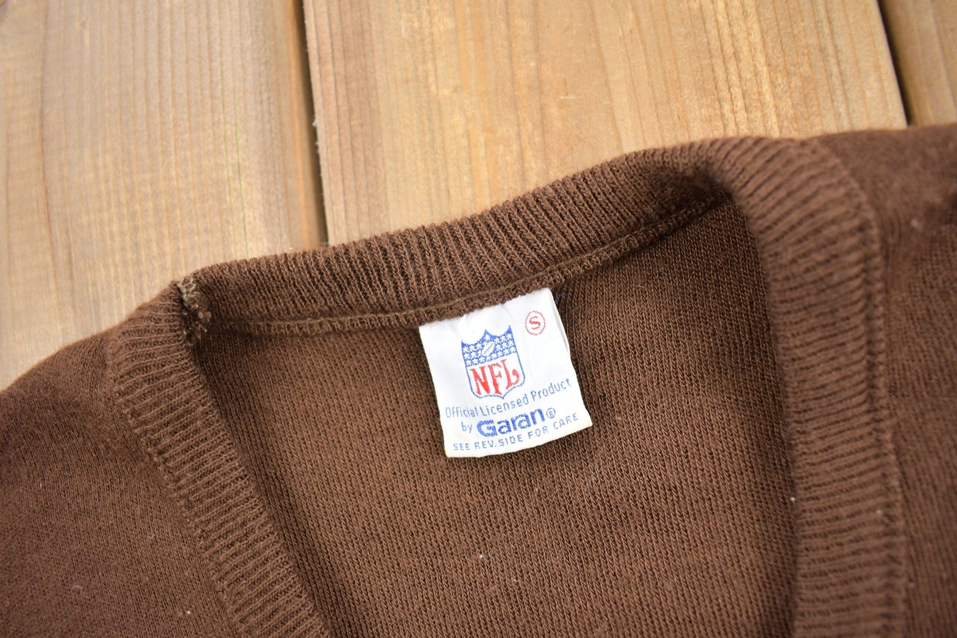Vintage 1990s Cleveland Browns NFL Knit V Neck Sweater Men's M from propervintagecanada