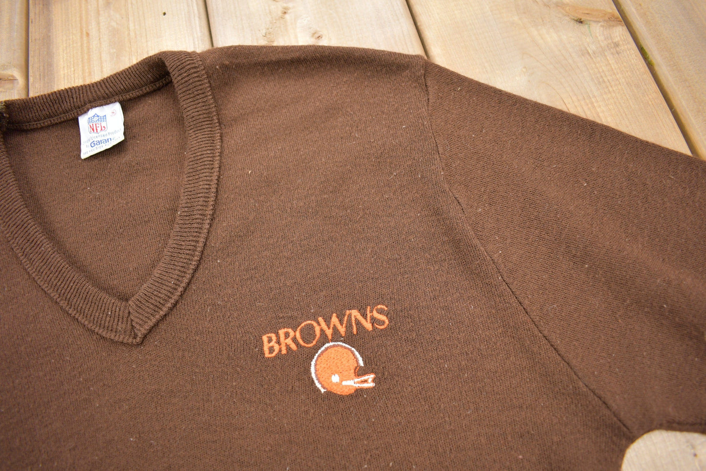 Vintage 1990s Cleveland Browns NFL Knit V Neck Sweater Men's M from propervintagecanada
