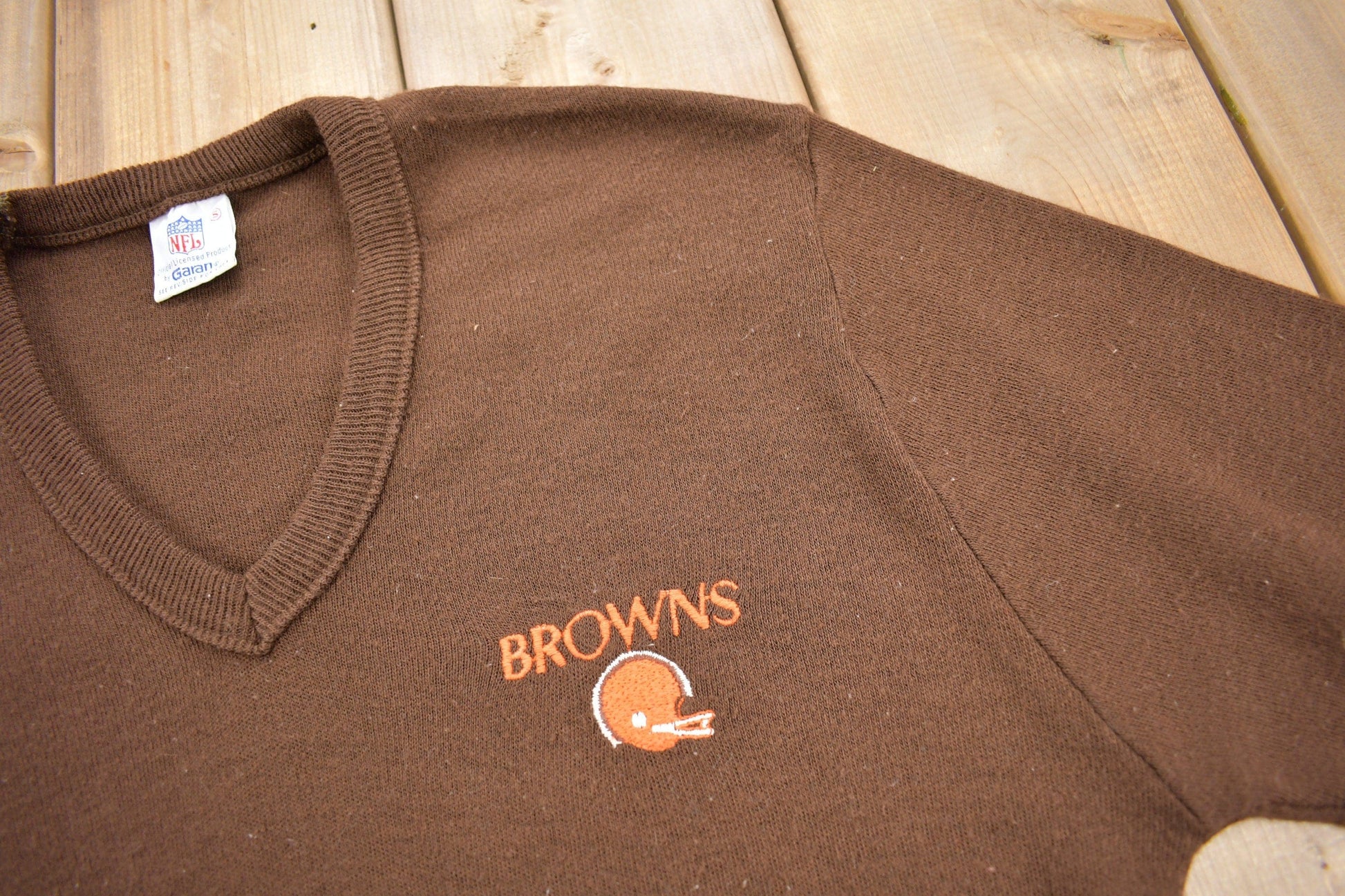 Vintage 1990s Cleveland Browns NFL Knit V Neck Sweater Men's M from propervintagecanada
