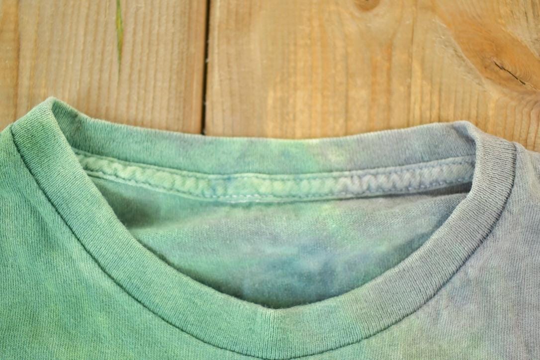 Vintage 1990s Clover Magic Souvenir Tye Die Single Stitch Graphic Print T-Shirt Men's Medium from propervintagecanada