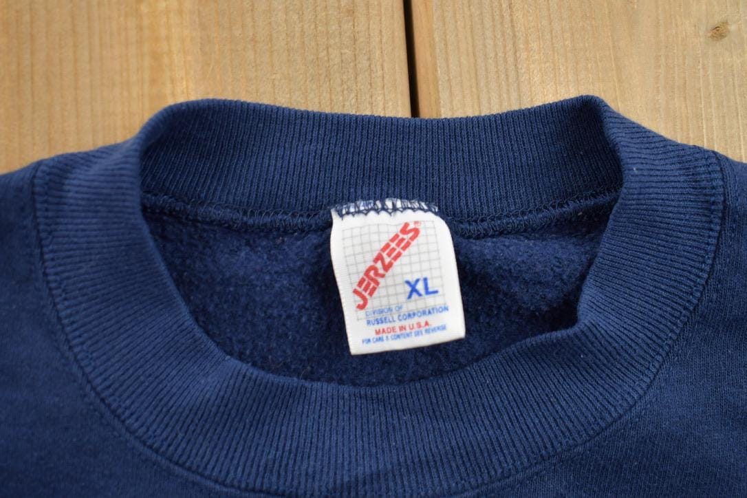 Vintage 1990s College Graphic Collegiate Crewneck Sweatshirt Men's Large from propervintagecanada