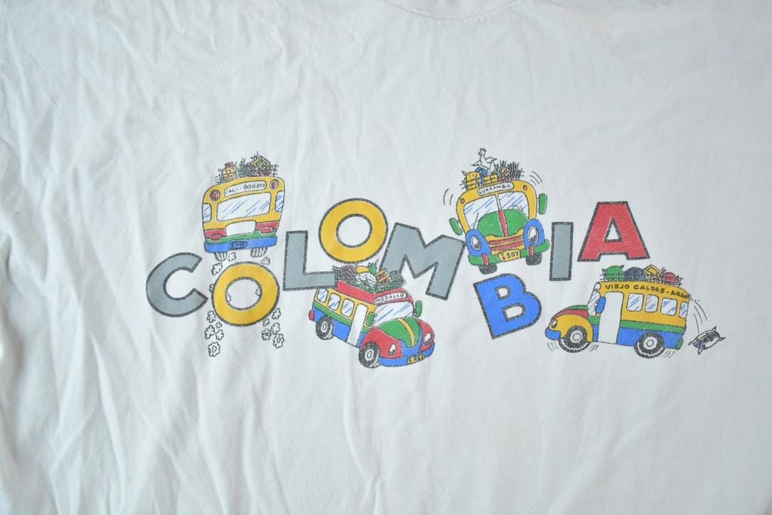 Vintage 1990s Columbia Souvenir Single Stitch Graphic Print T-Shirt Men's Large from propervintagecanada