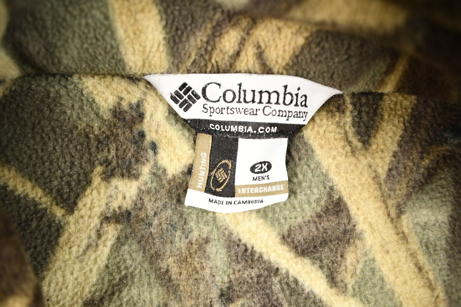 Vintage 1990s Columbia Sportswear Tree Camo Fleece Sweater Men's 2XL from propervintagecanada