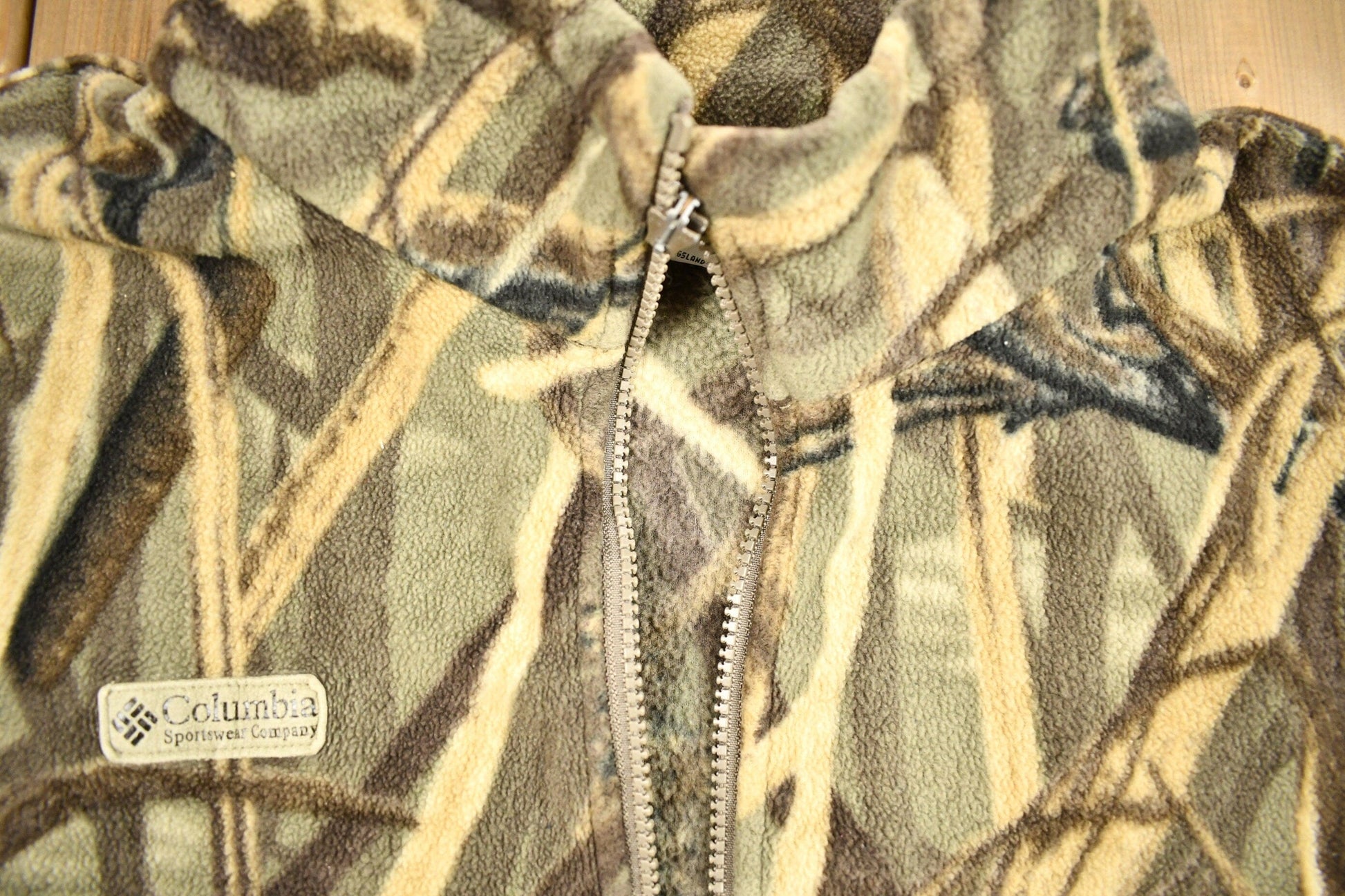 Vintage 1990s Columbia Sportswear Tree Camo Fleece Sweater Men's 2XL from propervintagecanada