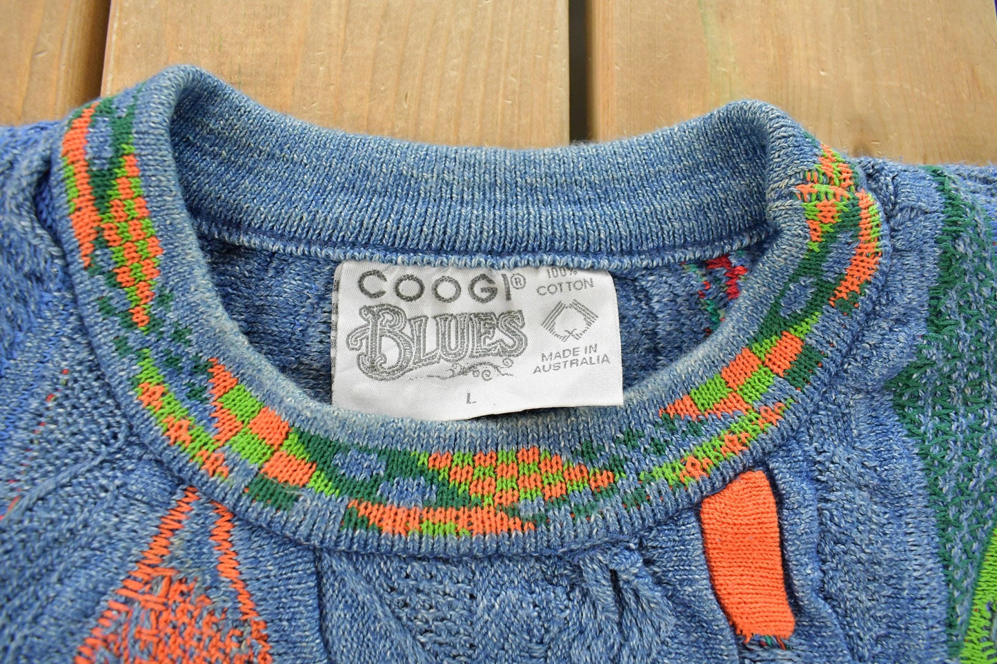 Vintage 1990s Coogi Blues 3D Abstract Knit Sweater Men's Large from propervintagecanada