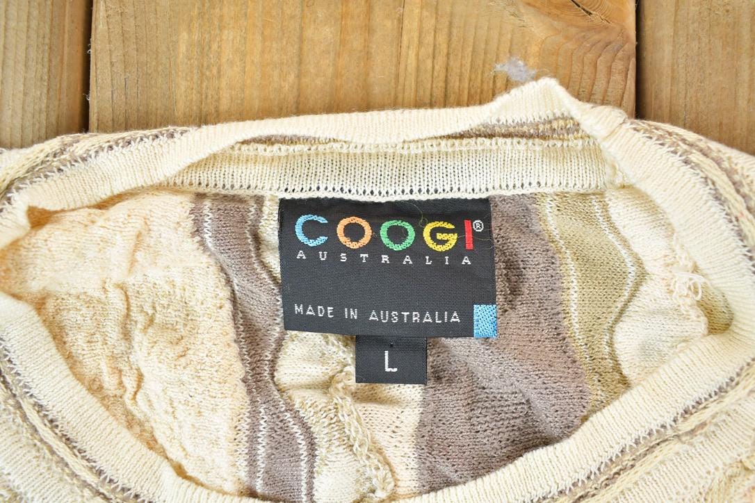 Vintage 1990s Coogi Made In Australia 3D knit 100% Cotton Cream Colour Abstract Pattern Knit Crewneck Sweater Men's Large from propervintagecanada