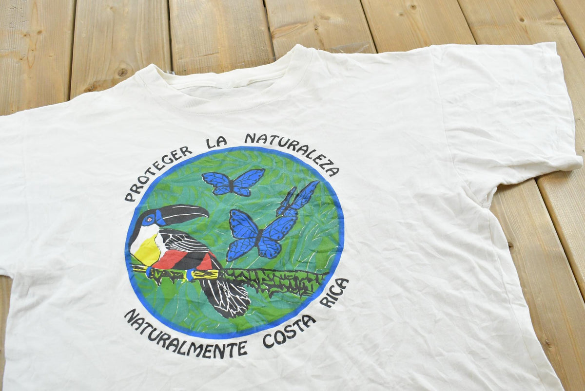 Vintage 1990s Costa Rica Protect Nature Toucan Butterfly Rainforest Souvenir Travel T-Shirt Men's L from propervintagecanada