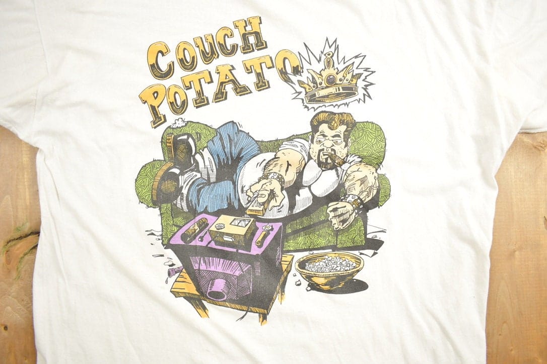Vintage 1990s Couch Potato Funny Graphic T-Shirt Men's Medium from propervintagecanada
