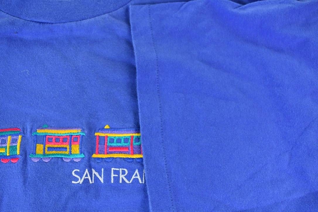 Vintage 1990s Crazy Stitch Hawaii Embroidered Souvenir San Francisco California Trolly Car T-Shirt Men's XL from propervintagecanada