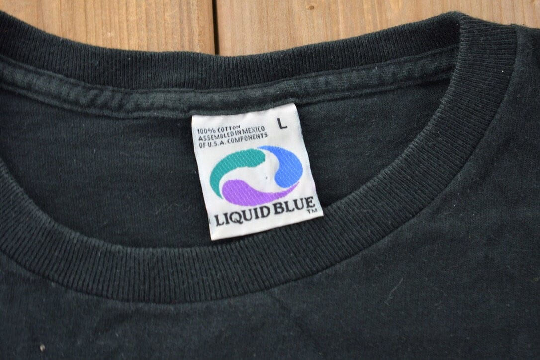 Vintage 1990s Dallas Cowboys Liquid Blue Graphic T-Shirt Men's Large from propervintagecanada