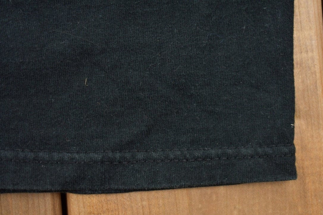 Vintage 1990s Dallas Cowboys Liquid Blue Graphic T-Shirt Men's Large from propervintagecanada