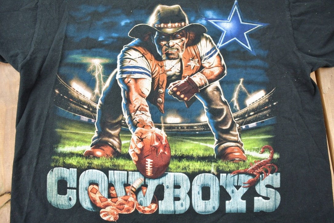 Vintage 1990s Dallas Cowboys Liquid Blue Graphic T-Shirt Men's Large from propervintagecanada