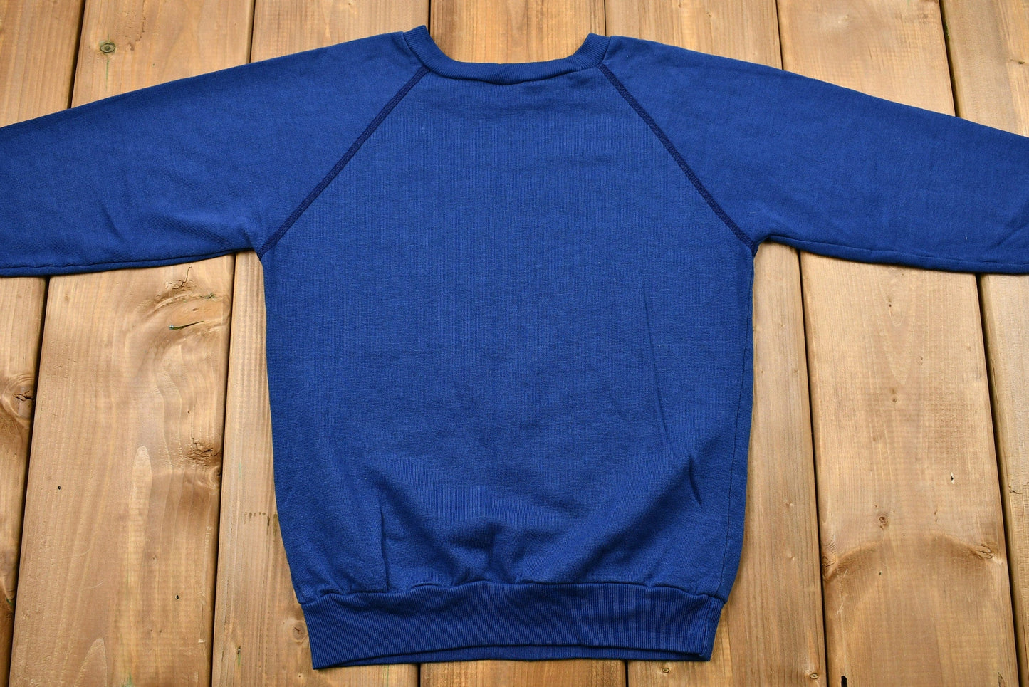 Vintage 1990s Dallas Cowboys Youth Raglan Sweatshirt Youth S from propervintagecanada