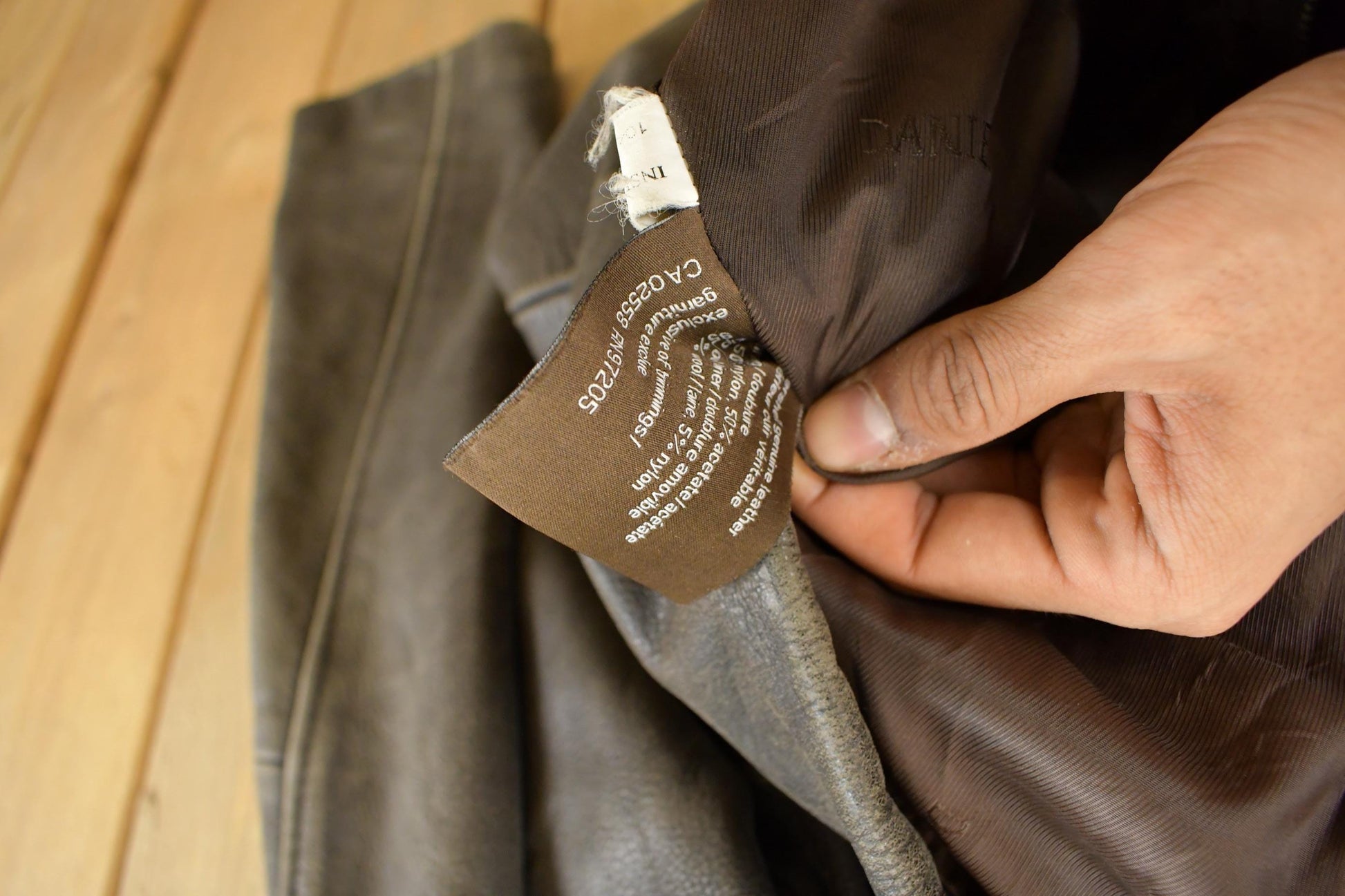 Vintage 1990s Danier Brown Leather Jacket Men's Large from propervintagecanada