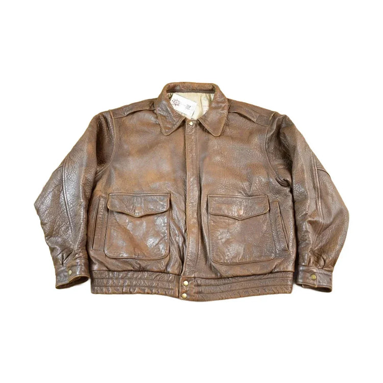 Vintage 1990s Danier Sport Brown Leather Bomber Jacket Size XL from propervintagecanada