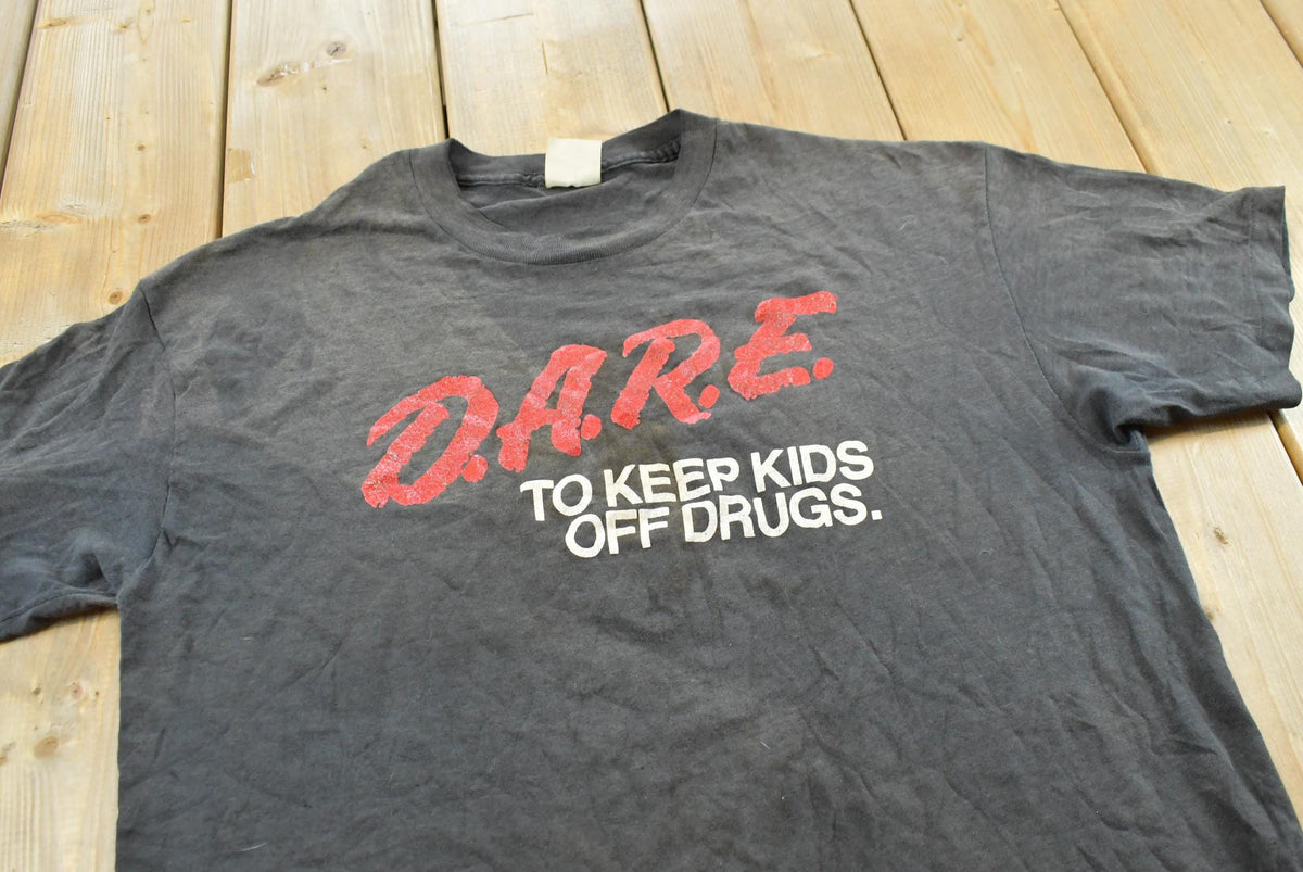 Vintage 1990s Dare to Resist Drugs And Violence Souvenir T-Shirt Men's L from propervintagecanada