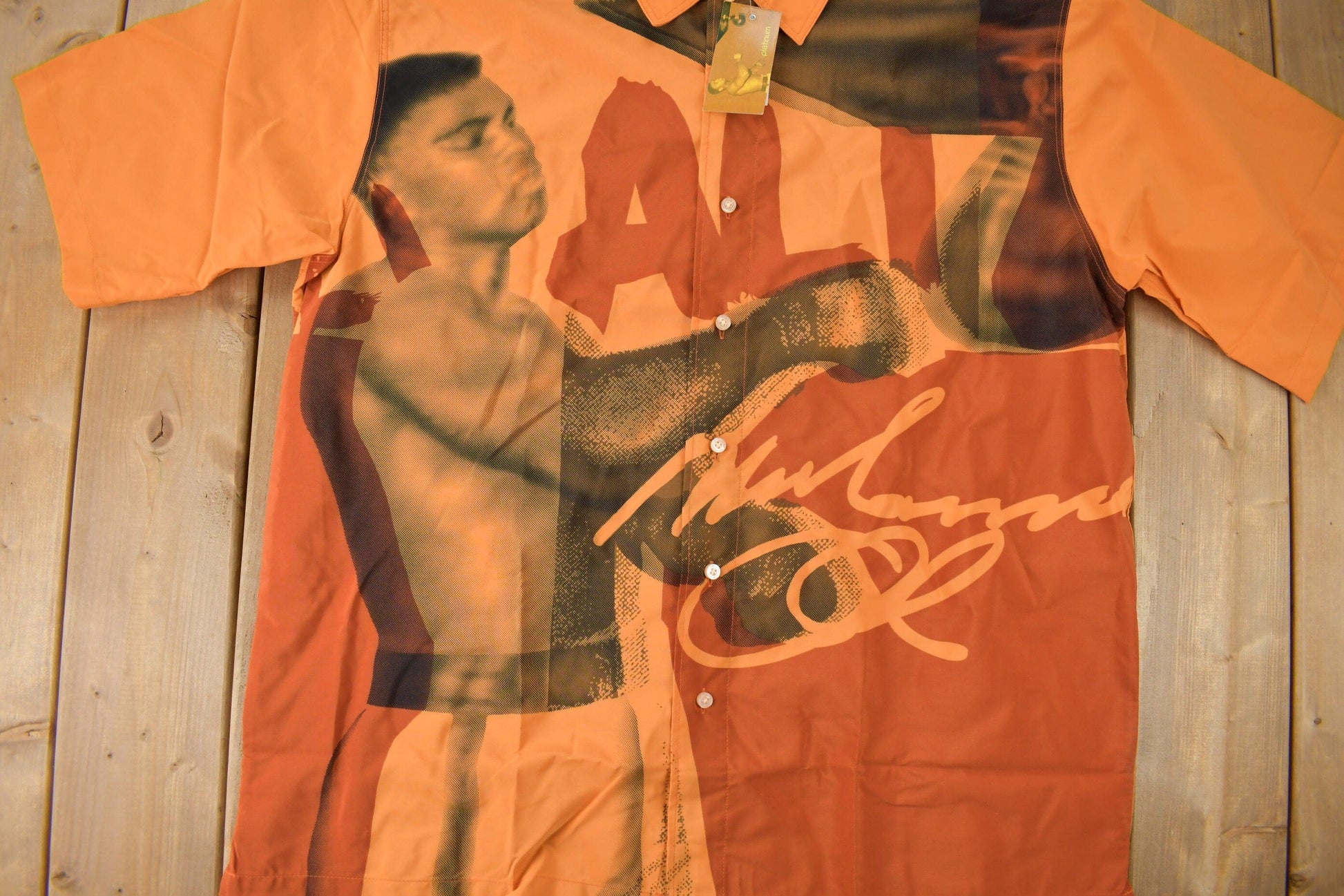 Vintage 1990s Deadstock Platinum Fubu Muhammad Ali All Over Print Button Up Shirt Men's 2XL from propervintagecanada