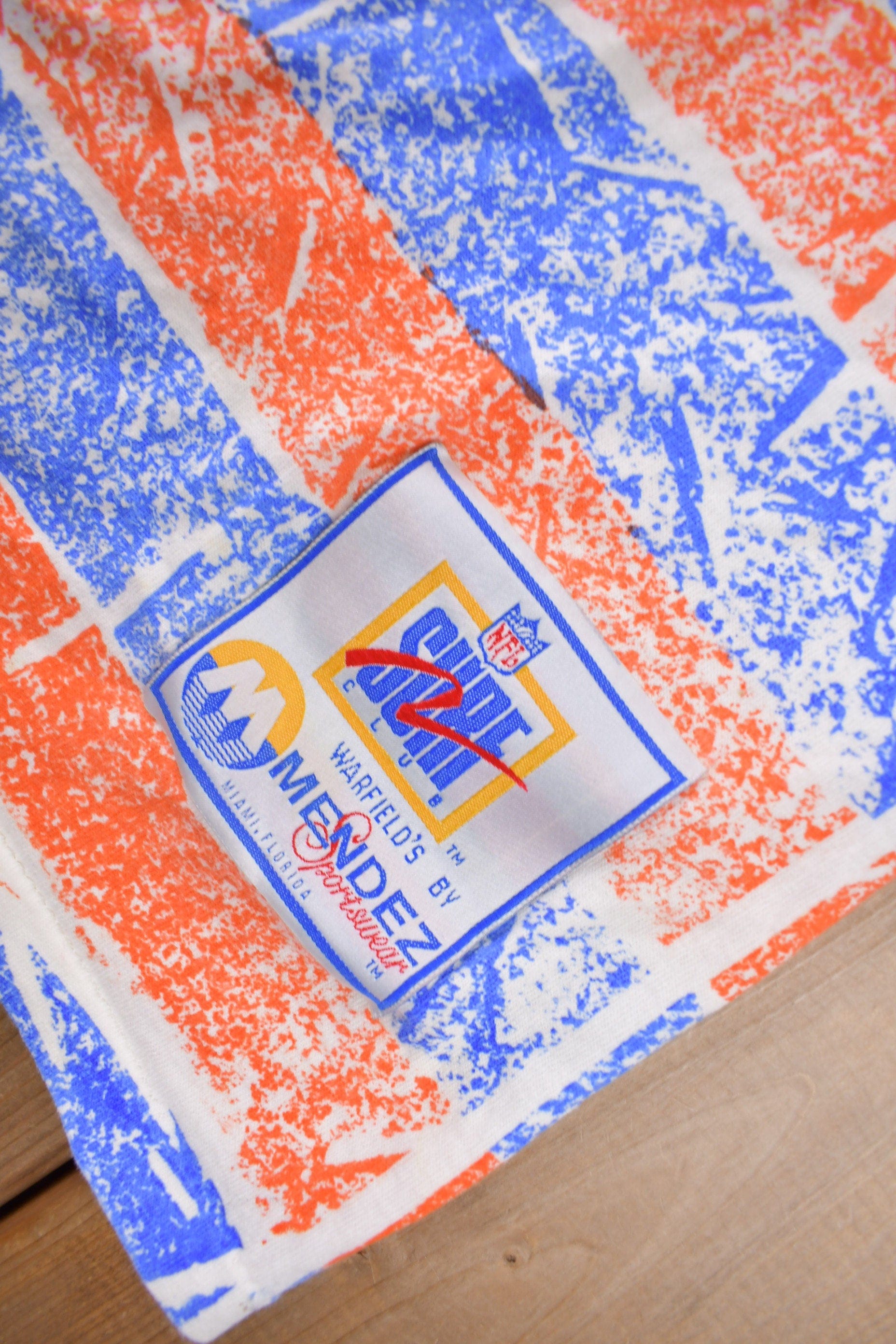 Vintage 1990s Denver Broncos NFL Football All Over Print Graphic T-Shirt Men's Large from propervintagecanada