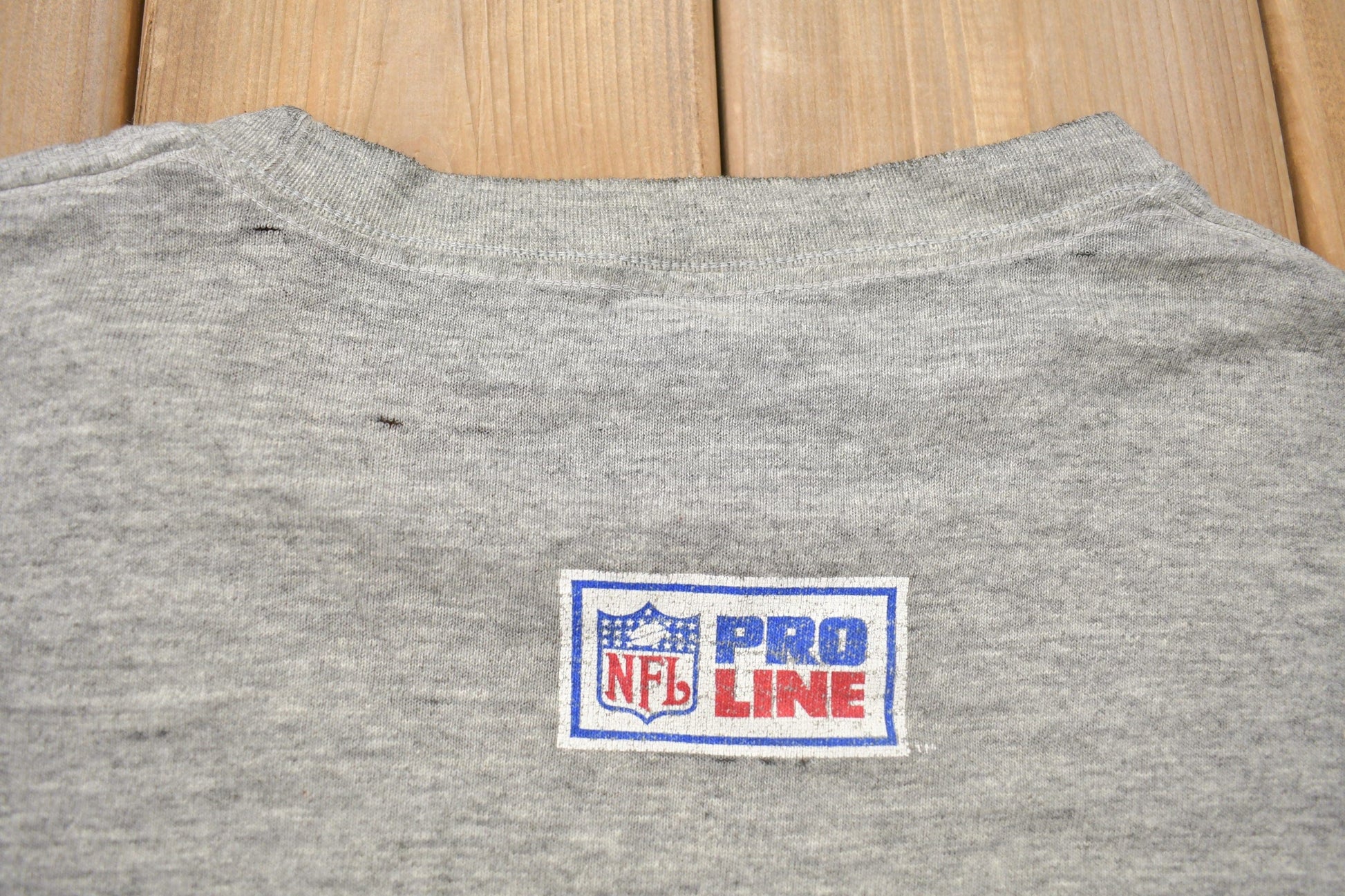 Vintage 1990s Detroit Lions Helmet NFL Starter Pro Line T Shirt Men's XL from propervintagecanada